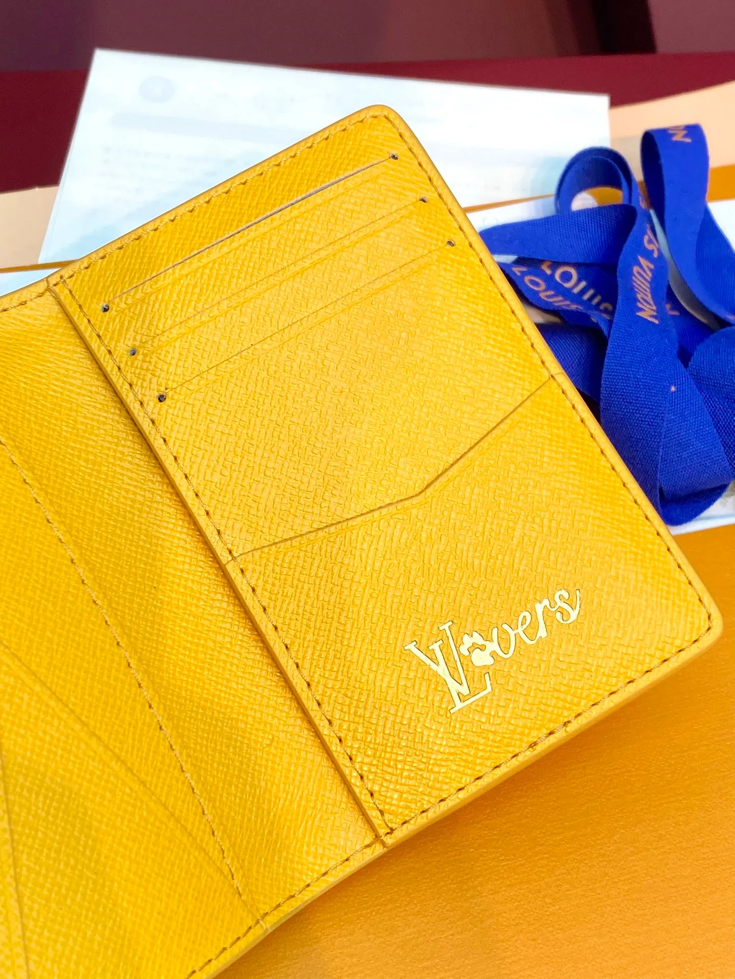 M12659 Yellow! Pocket wallet, this pocket wallet is made of Monogram Heritage coated canvas, which is integrated with classic elements such as the vertical and horizontal texture of Damier check and the Marque L.Vuitton Déposée logo, showing Pharrell Williams' modern interpretation of the Monogram pattern.  11.1 x 1 x 7.5 cm (height x width x length). 💰320