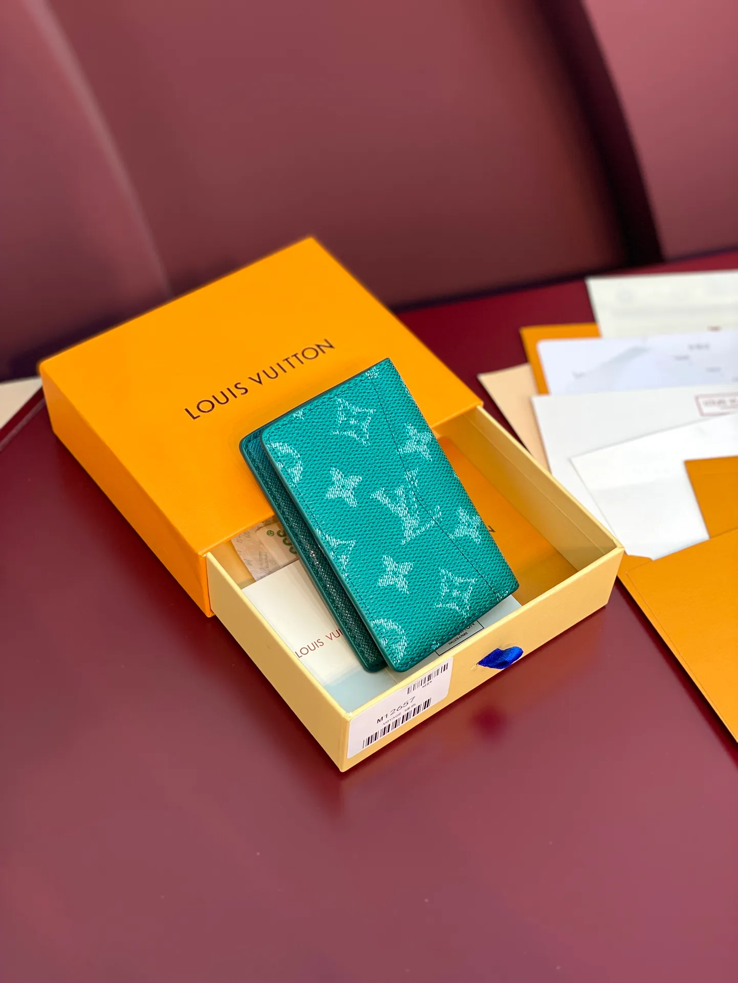 M12659 green! Pocket wallet, this pocket wallet is made of Monogram Heritage coated canvas, which is integrated with classic elements such as the vertical and horizontal texture of Damier check and the Marque L.Vuitton Déposée logo, showing Pharrell Williams' modern interpretation of the Monogram pattern.  11.1 x 1 x 7.5 cm (height x width x length). 💰320