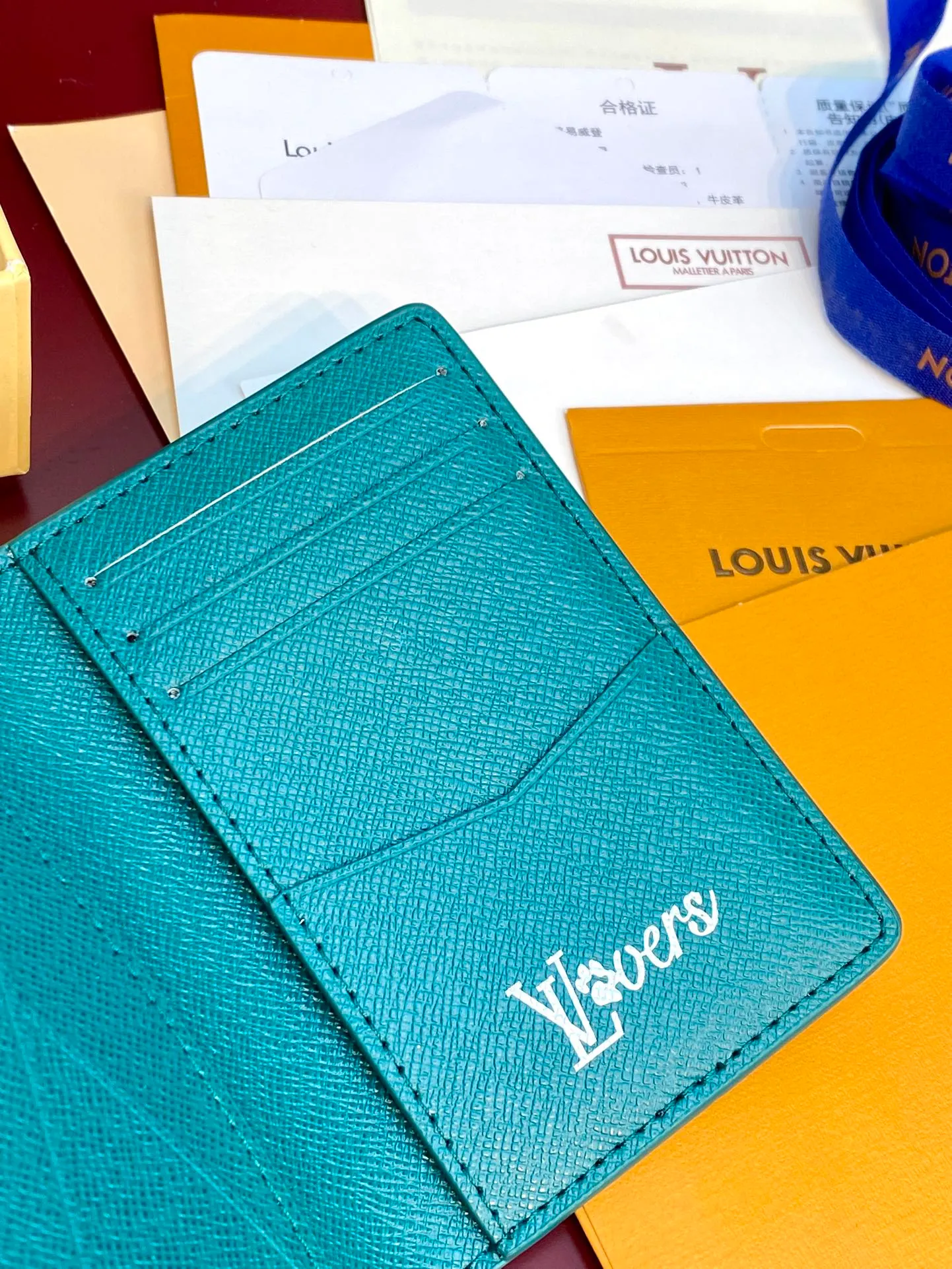 M12659 green! Pocket wallet, this pocket wallet is made of Monogram Heritage coated canvas, which is integrated with classic elements such as the vertical and horizontal texture of Damier check and the Marque L.Vuitton Déposée logo, showing Pharrell Williams' modern interpretation of the Monogram pattern.  11.1 x 1 x 7.5 cm (height x width x length). 💰320