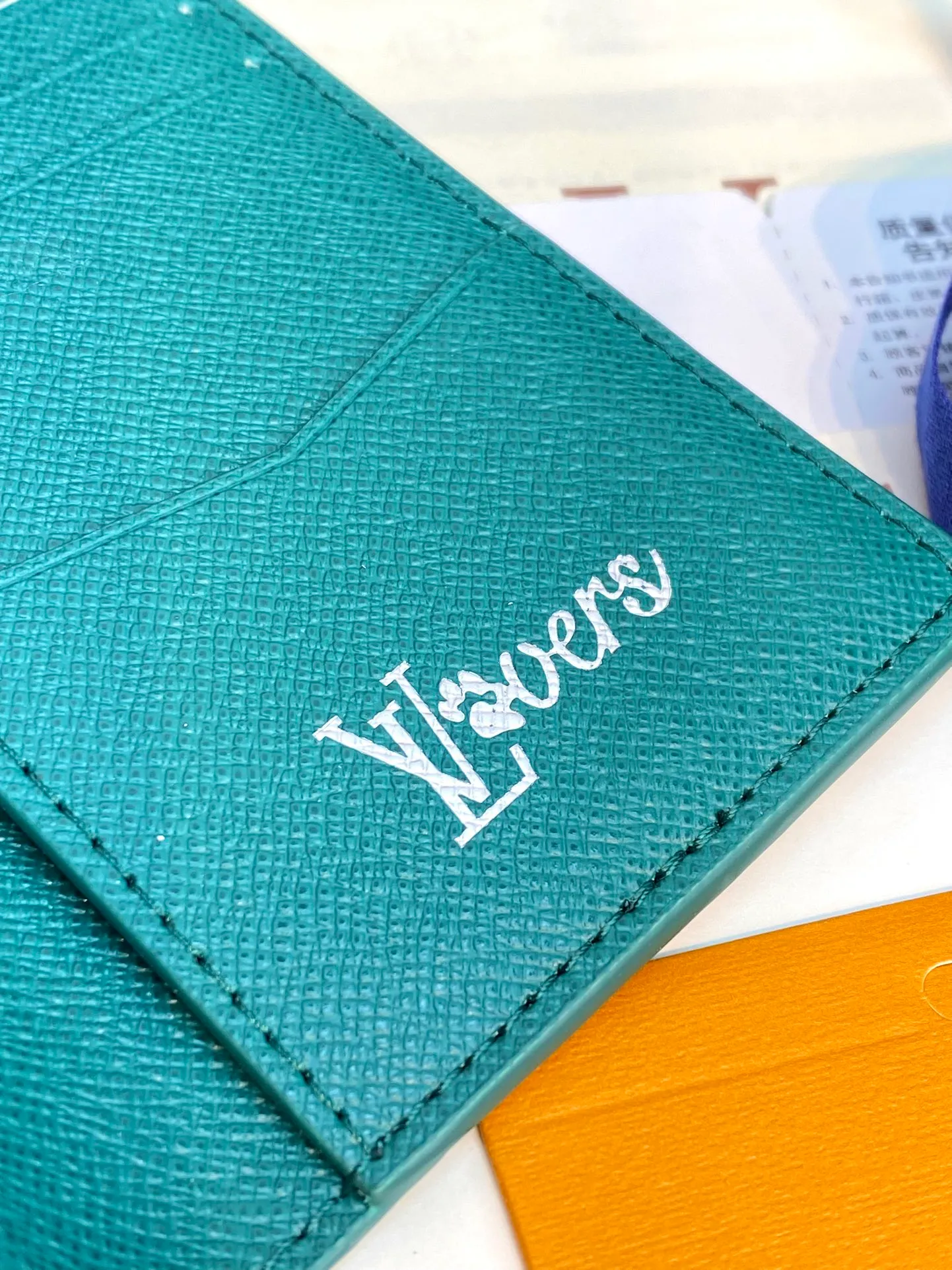 M12659 green! Pocket wallet, this pocket wallet is made of Monogram Heritage coated canvas, which is integrated with classic elements such as the vertical and horizontal texture of Damier check and the Marque L.Vuitton Déposée logo, showing Pharrell Williams' modern interpretation of the Monogram pattern.  11.1 x 1 x 7.5 cm (height x width x length). 💰320