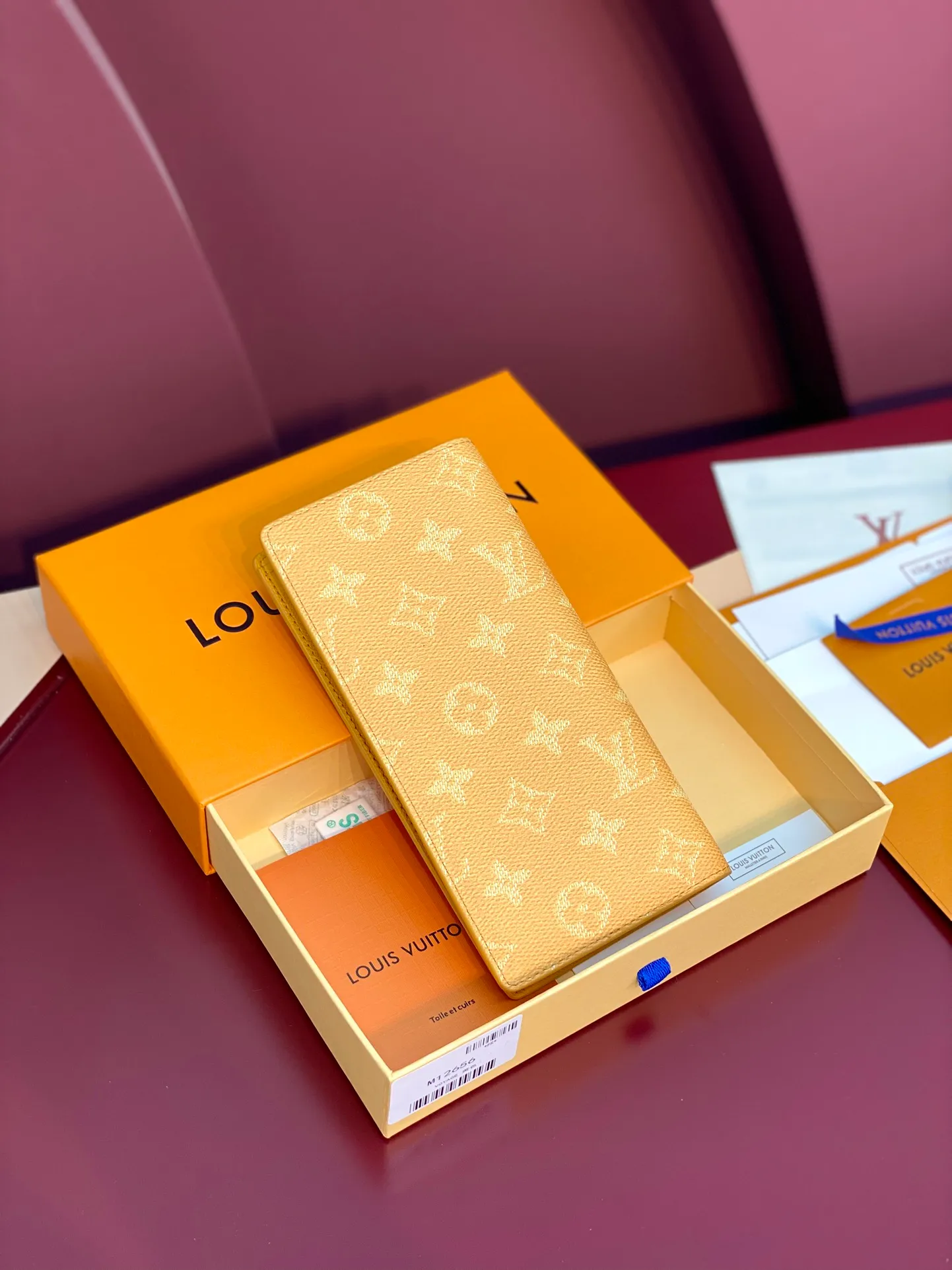 M12656 Yellow! BRAZZA Wallet, this Brazza Wallet is made of Monogram Heritage canvas, witnessing Pharrell Williams' new interpretation of the iconic Monogram pattern. Criss-crossing textures and the Marque L.Vuitton Déposée logo reflect classic elements of the original Damier print, while multiple card slots and compartments complete the long design without sacrificing functional details.  19 x 2 x 10 cm (height x width x length). 💰380