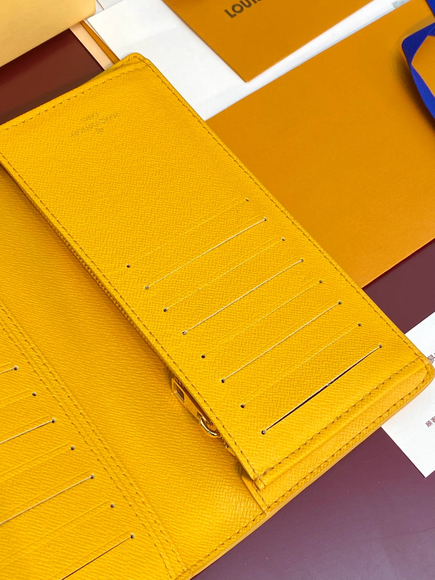 M12656 Yellow! BRAZZA Wallet, this Brazza Wallet is made of Monogram Heritage canvas, witnessing Pharrell Williams' new interpretation of the iconic Monogram pattern. Criss-crossing textures and the Marque L.Vuitton Déposée logo reflect classic elements of the original Damier print, while multiple card slots and compartments complete the long design without sacrificing functional details.  19 x 2 x 10 cm (height x width x length). 💰380
