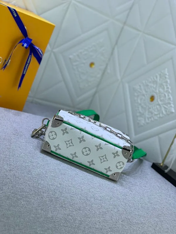 All Categories Official Website "Brand Women's Bags" Women's Bags 💙 LV has the new "Louis Vuitton!" signature printed on its vintage Monogram canvas and chunky chain, a mini soft trunk bag that is part of Virgil Abra's everyday LV capsule of the Men's Fall/Winter 2021-22 collection. Boxy shape and eight pieces of hardware to reinforce the corners. Can