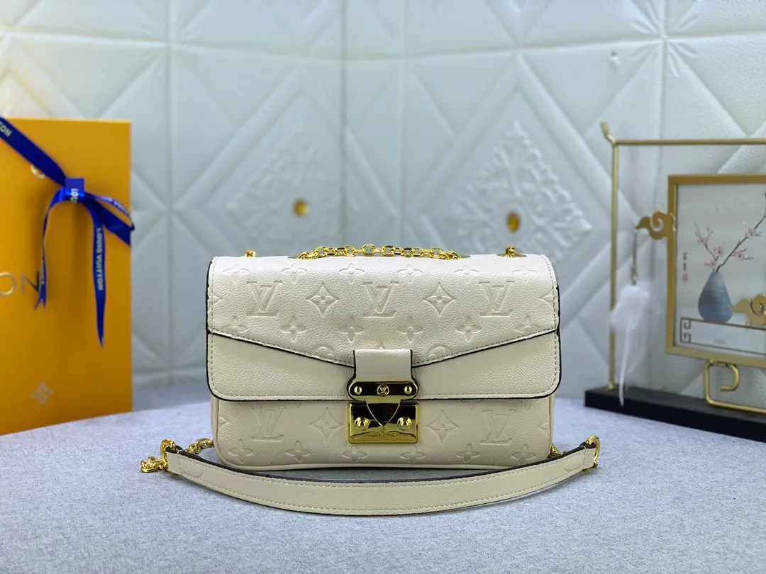 All Categories Official Website "Brand Women's Bags" Women's Bags 💙 LV Upgraded Original This Marceau chain bag is made of Monogram Empreinte embossed leather, with a plain leather flap and soft leather lining. Signature S-lock clasp and chain add to the elegance, and there's room for a large wallet and iPhone