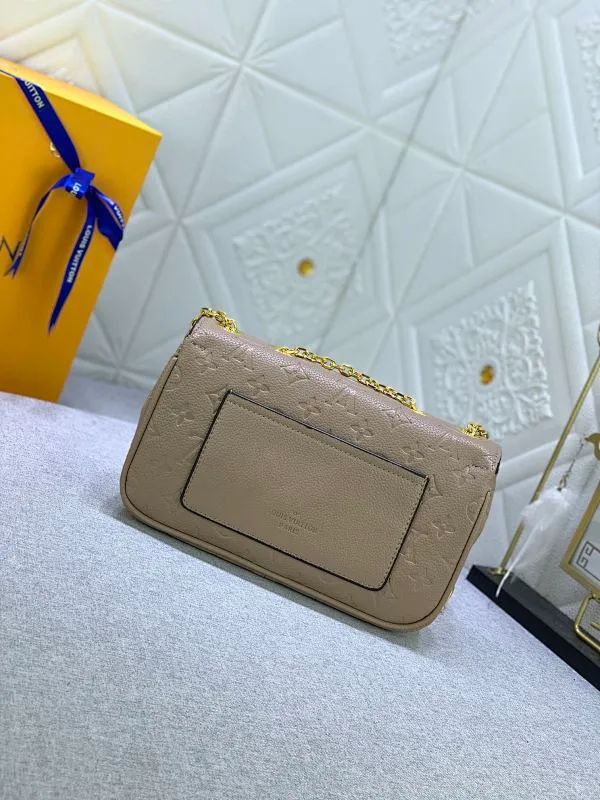 All Categories Official Website "Brand Women's Bags" Women's Bags 💙 LV Upgraded Original This Marceau chain bag is made of Monogram Empreinte embossed leather, with a plain leather flap and soft leather lining. Signature S-lock clasp and chain add to the elegance, and there's room for a large wallet and iPhone