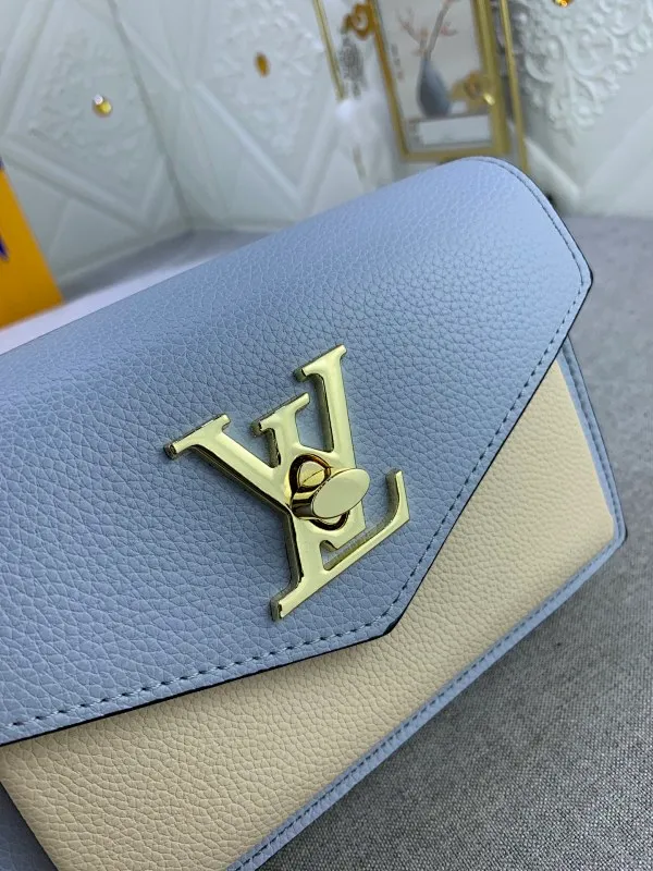 All Categories Official Website "Brand Women's Bags" Women's Bags 💙 LV This Mylockme Pochette chain bag is made of soft cow leather and continues the core elements of the Lockme series with an envelope-style flap, front pocket and LV letter hook. The trendy construction is suitable for storing mobile phones and other essentials, and the long chain allows for shoulder or cross-body wear. Detailed