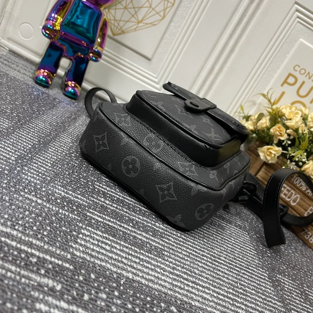 All categories Official website "Brand Women's Bags" Women's Bags 💙 LV Christopher mini handbag is made of iconic Monogram Macassar material and matte metal parts, with adjustable shoulder straps, and a dynamic atmosphere bursts out. It also features spacious compartments and front pockets, providing a modern way to carry your daily essentials. Dimensions: 15.0 x