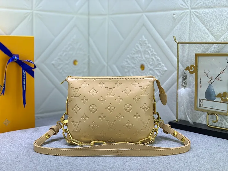 All categories Official website "Brand Women's Bags" Women's Bags 💙 LV Coussin BB handbags made a splash at the 2021 spring and summer fashion show. Monogram embossed puffy sheepskin creates a pillow-shaped structure that brings an edgy edge to a simple design. It can be worn cross-body using the shoulder strap or transformed into a chain baguette bag, or can be carried under the arm. Detailed features 20 x 16