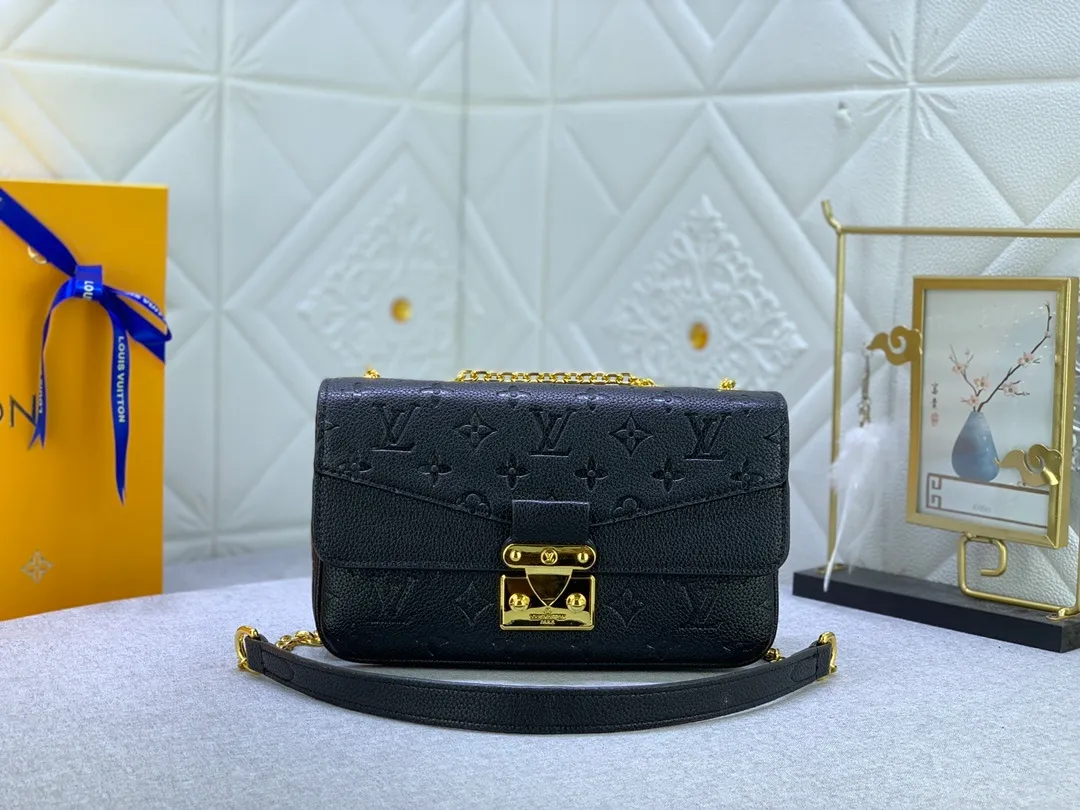 All Categories Official Website "Brand Women's Bags" Women's Bags 💙 LV Upgraded Original This Marceau chain bag is made of Monogram Empreinte embossed leather, with a plain leather flap and soft leather lining. Signature S-lock clasp and chain add to the elegance, and there's room for a large wallet and iPhone