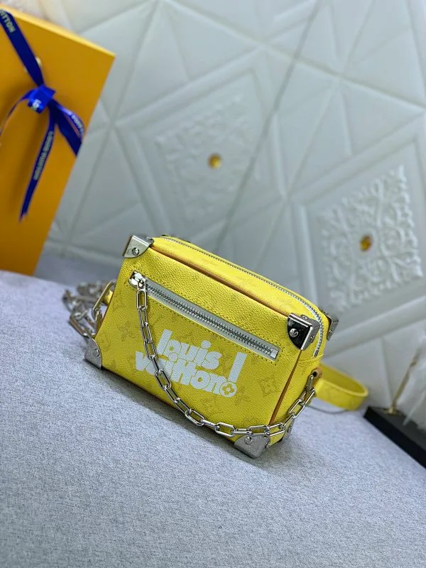 All Categories Official Website "Brand Women's Bags" Women's Bags 💙 LV has the new "Louis Vuitton!" signature printed on its vintage Monogram canvas and chunky chain, a mini soft trunk bag that is part of Virgil Abra's everyday LV capsule of the Men's Fall/Winter 2021-22 collection. Boxy shape and eight pieces of hardware to reinforce the corners. Can