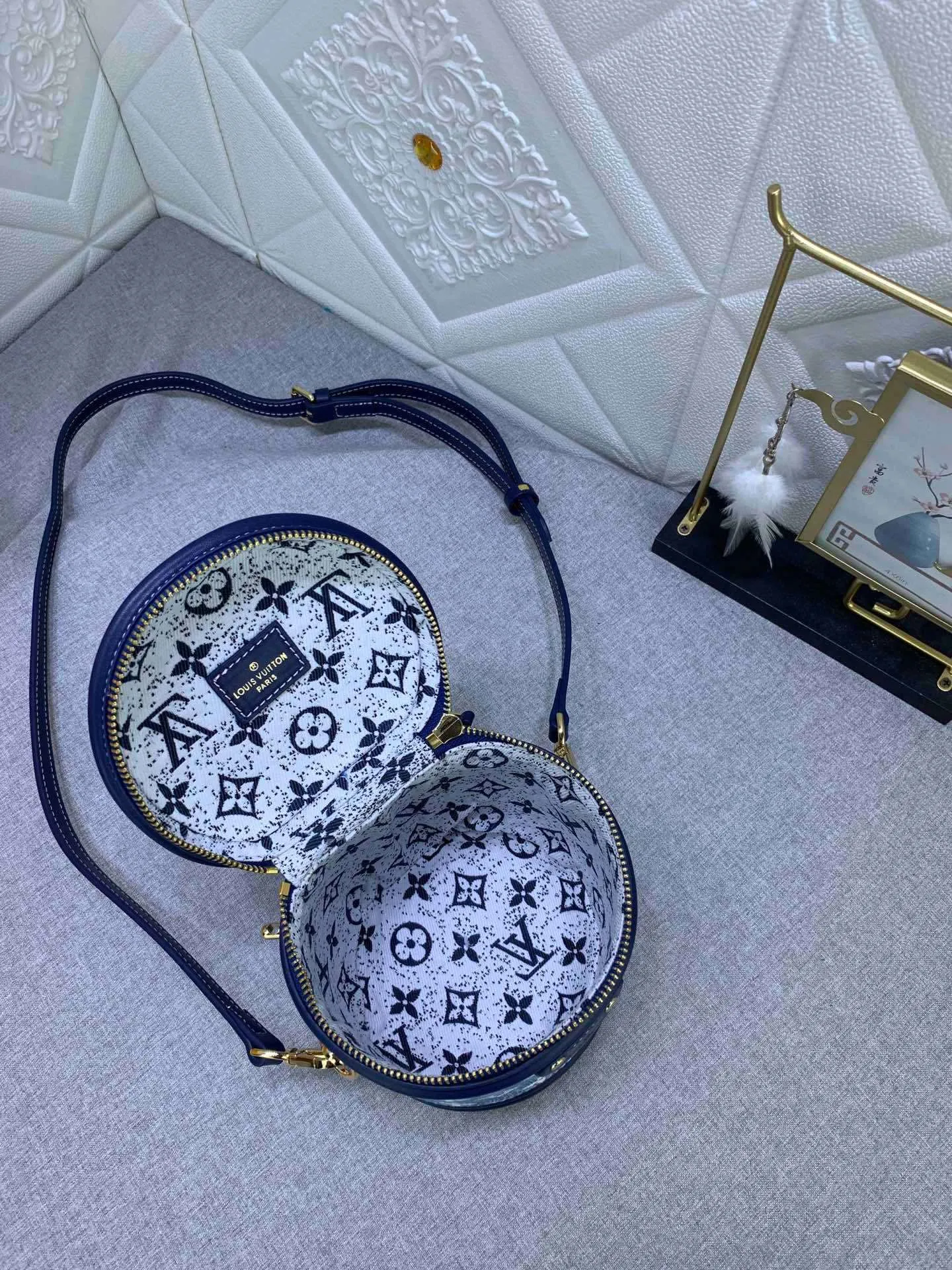 All Categories Official Website "Brand Women's Bags" Women's Bags 💙 LV upgraded original gradient denim blue cannes fortune bag. Drawing on the shape of a long-standing makeup box, women's art director Nicolas Ghesquière recreates the classic charm of the past with this semi-rigid handbag. Monogram and Monogram Reverse