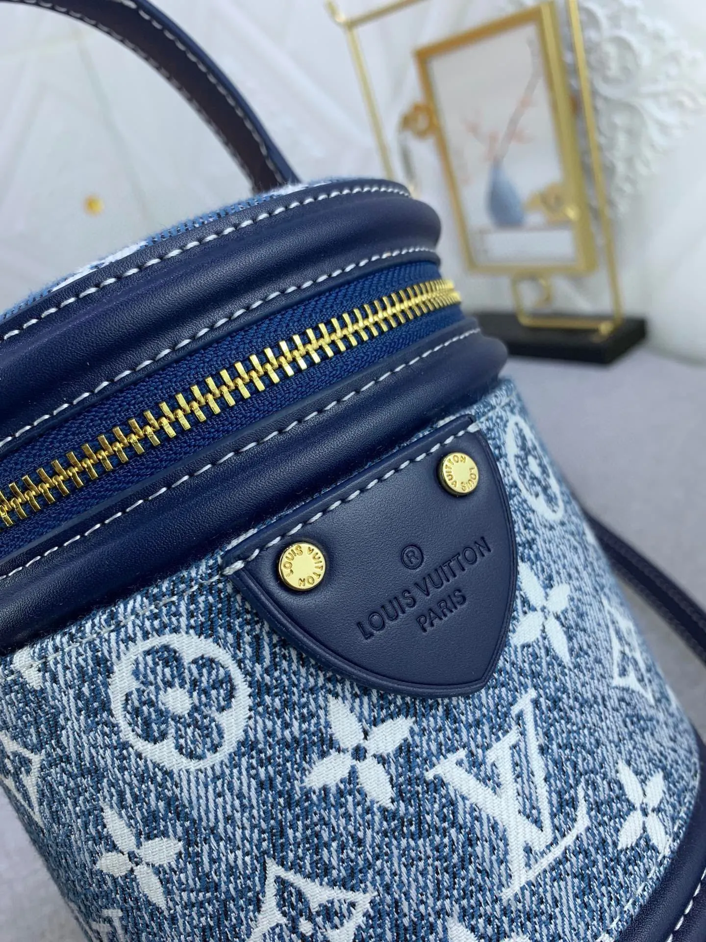 All Categories Official Website "Brand Women's Bags" Women's Bags 💙 LV upgraded original gradient denim blue cannes fortune bag. Drawing on the shape of a long-standing makeup box, women's art director Nicolas Ghesquière recreates the classic charm of the past with this semi-rigid handbag. Monogram and Monogram Reverse