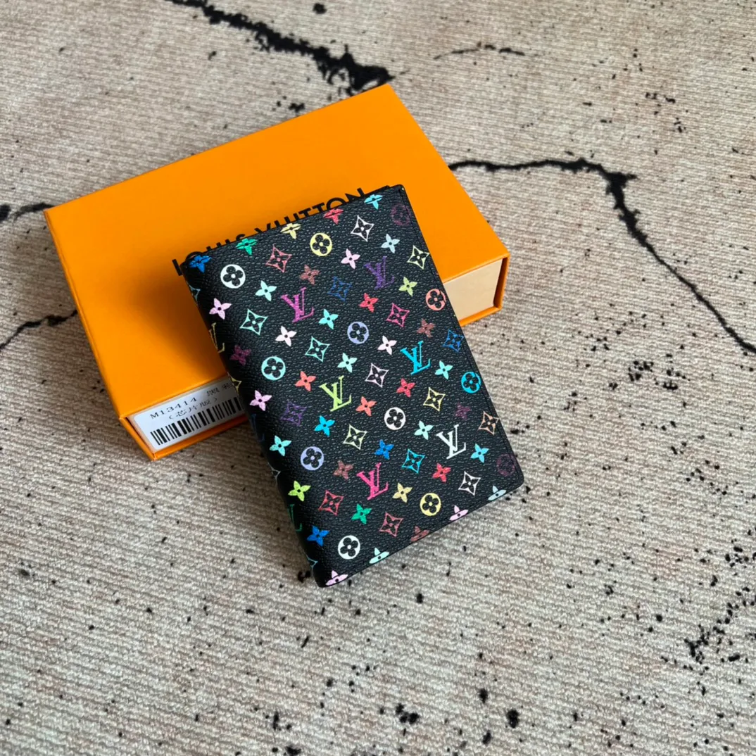 Factory Price 280 Top Original LV x TM Passport Case M13414 Black Color (White Color Black Color-Takashi Murakami) This passport cover is lined with coated canvas and cow leather, and the Monogram pattern is updated with the rainbow tones of artist Takashi Murakami, which expresses the dynamic style of the Louis Vuitton x Murakami collaboration series. Card compartments and multiple pockets add functional details. Dimensions: 14 x 2.5 x 10 cm