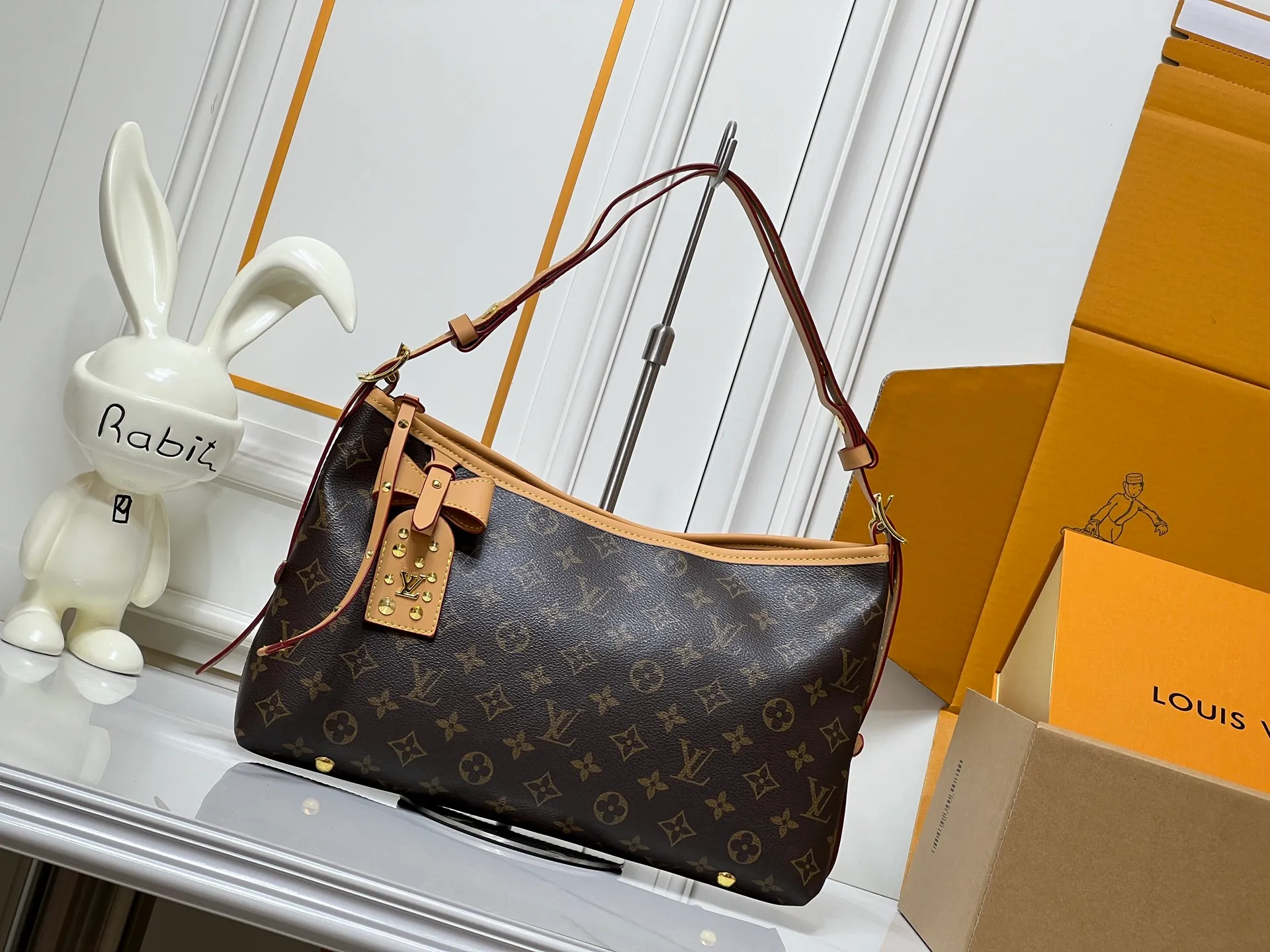 Batch 240💰Upgraded from the original M46203 M27578 CarryAll medium handbag, with Monogram canvas and leather trim to create a body-fitting design. There's a zipped pocket inside the ample space, and a detachable zipped clutch adds a functional element, with a buckle-adjustable handle. Small size: 32x 22x 10 cm,
