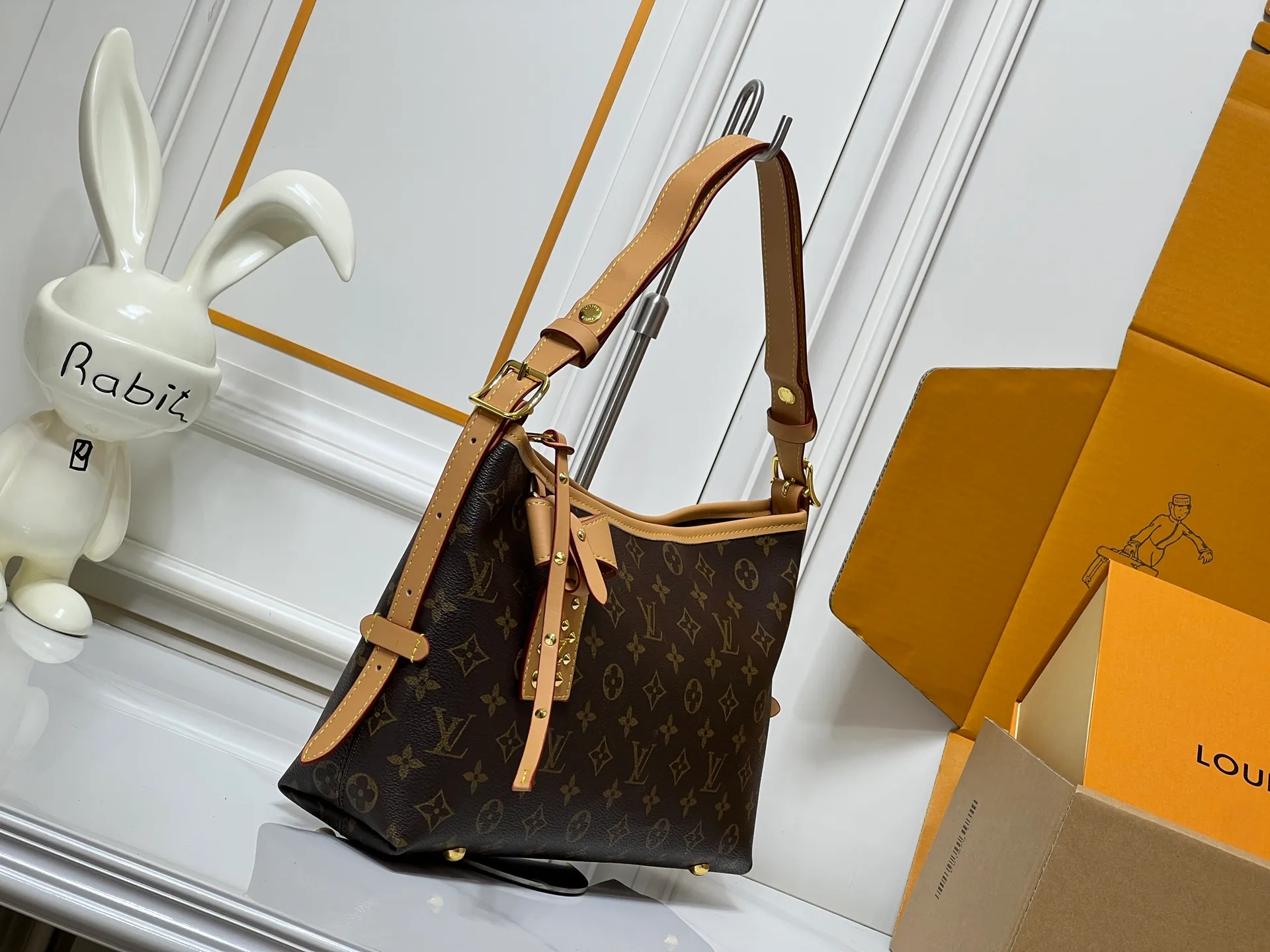 Batch 240💰Upgraded from the original M46203 M27578 CarryAll medium handbag, with Monogram canvas and leather trim to create a body-fitting design. There's a zipped pocket inside the ample space, and a detachable zipped clutch adds a functional element, with a buckle-adjustable handle. Small size: 32x 22x 10 cm,