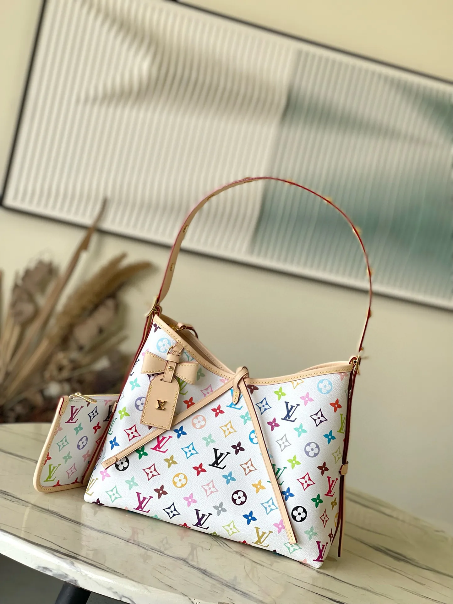 💰1100 Top Original Order M13661 This small CarryAll handbag comes from the Louis Vuitton Calf leather trim creates a figure-hugging fit, and a designer plaque details the elegant bow. Dimensions: 29 × 24 × 12 cm
