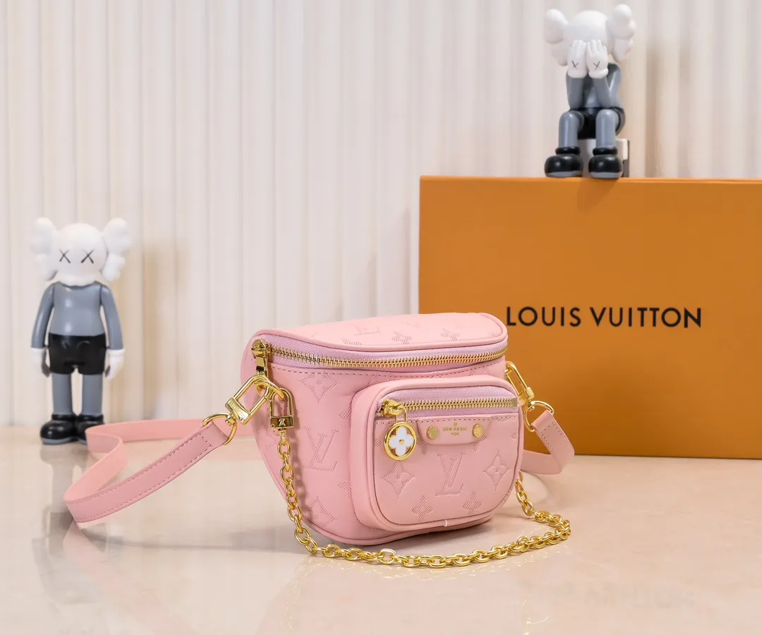 Batch 240💰Upgraded original M46917 M82335 M83275 M82208 M82347 This Mini Bumbag handbag comes from the LV Gradient series, and the Monogram embossing of Monogram Empreinte leather renders gradient midsummer colors. The on-trend construction features a zipped main compartment and a front pocket with a Louis Vuitton leather label. With the detachable chain and detachable and adjustable shoulder strap, it can be worn as a shoulder or cross-body bag. 17.0 x 12.0 x 9.5 cm (L x H x W) • Monogram Empreinte embossed soft-grained cowhide leather • Textile lining • Metal hardware • Zip closure • Zip front pocket • Shoulder strap: removable, adjustable • Half-length strap: 32.0 cm • Half-length strap adjustable to: 44.0 cm • Chain: Removable • Half-length chain: 20.0 cm