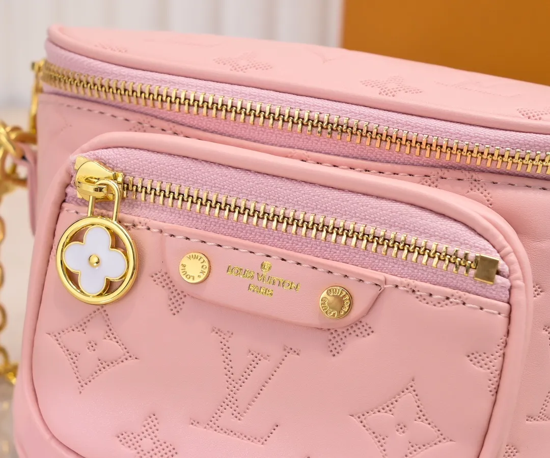 Batch 240💰Upgraded original M46917 M82335 M83275 M82208 M82347 This Mini Bumbag handbag comes from the LV Gradient series, and the Monogram embossing of Monogram Empreinte leather renders gradient midsummer colors. The on-trend construction features a zipped main compartment and a front pocket with a Louis Vuitton leather label. With the detachable chain and detachable and adjustable shoulder strap, it can be worn as a shoulder or cross-body bag. 17.0 x 12.0 x 9.5 cm (L x H x W) • Monogram Empreinte embossed soft-grained cowhide leather • Textile lining • Metal hardware • Zip closure • Zip front pocket • Shoulder strap: removable, adjustable • Half-length strap: 32.0 cm • Half-length strap adjustable to: 44.0 cm • Chain: Removable • Half-length chain: 20.0 cm