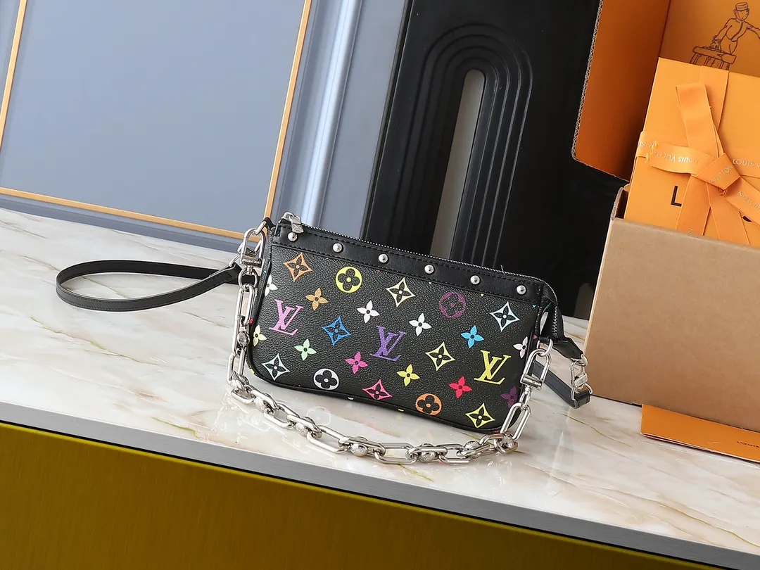 💰200💰Upgraded original M13663 M13404 M13440 M92649 This Pochette Accessoires handbag is made of coated canvas, with colorful Monogram patterns to interpret the smart style of the Louis Vuitton x Murakami cross-border collaboration series. Calf leather trim and dazzling hardware add to the sophisticated details, while the detachable shoulder strap and chain allow for flexible carry. Dimensions: 22.0 x 13.0 x 4.0 cm (length x height x width)