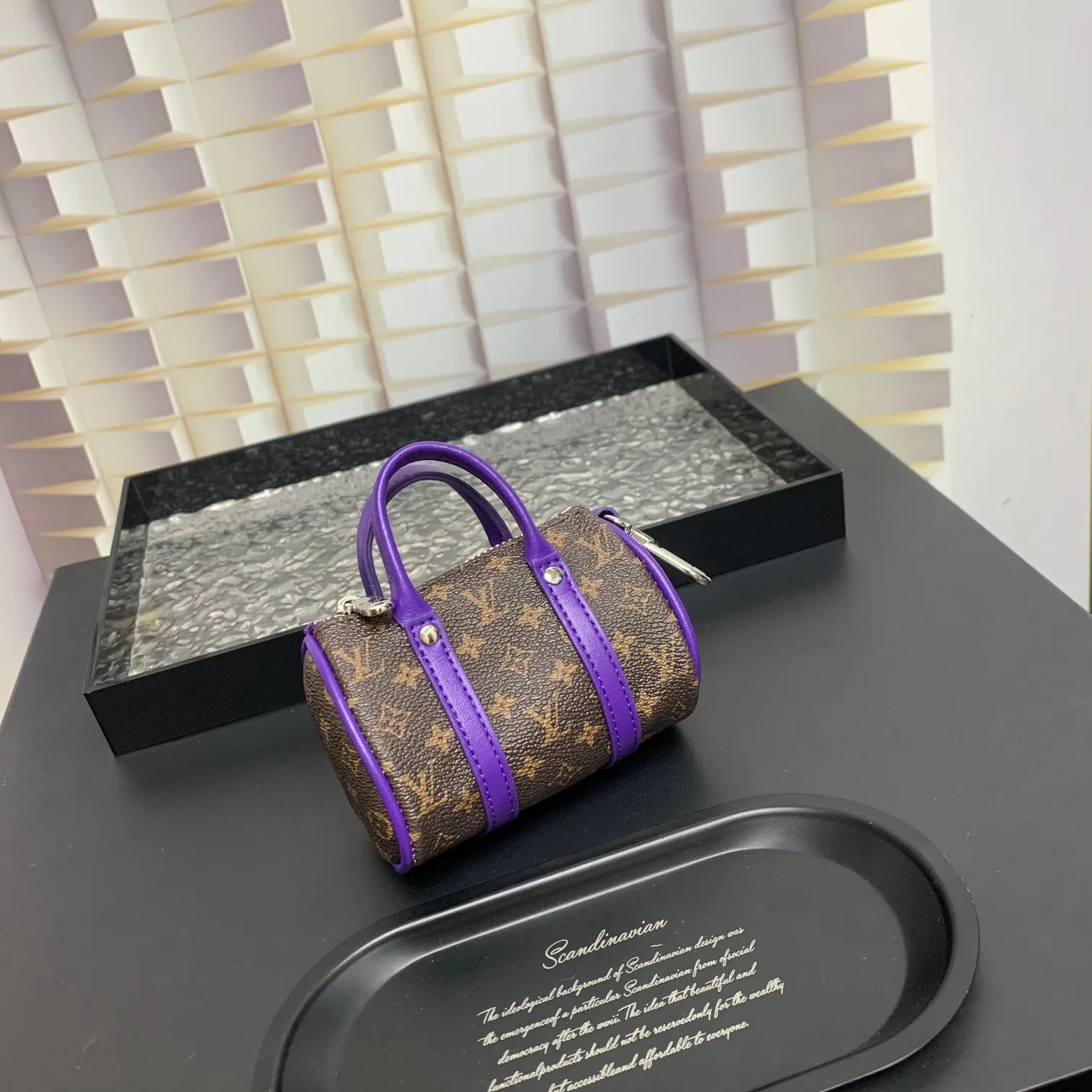 💰200 shipped😍 MINI KEEPALL bag charm and keychain ☀️Louis Vuitton Louis Vuitton lv mini pillow bag pendant ☀️This Mini Keepall bag charm and keychain condenses the classic handbag configuration, boldly showing the spirit of adventure. Monogram canvas with LV inscribed hook buckle, whether hung on a belt or handbag, its zipper closure and built-in keychain ensure secure storage