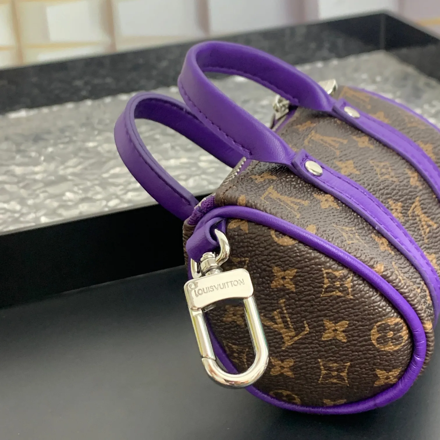 💰200 shipped😍 MINI KEEPALL bag charm and keychain ☀️Louis Vuitton Louis Vuitton lv mini pillow bag pendant ☀️This Mini Keepall bag charm and keychain condenses the classic handbag configuration, boldly showing the spirit of adventure. Monogram canvas with LV inscribed hook buckle, whether hung on a belt or handbag, its zipper closure and built-in keychain ensure secure storage