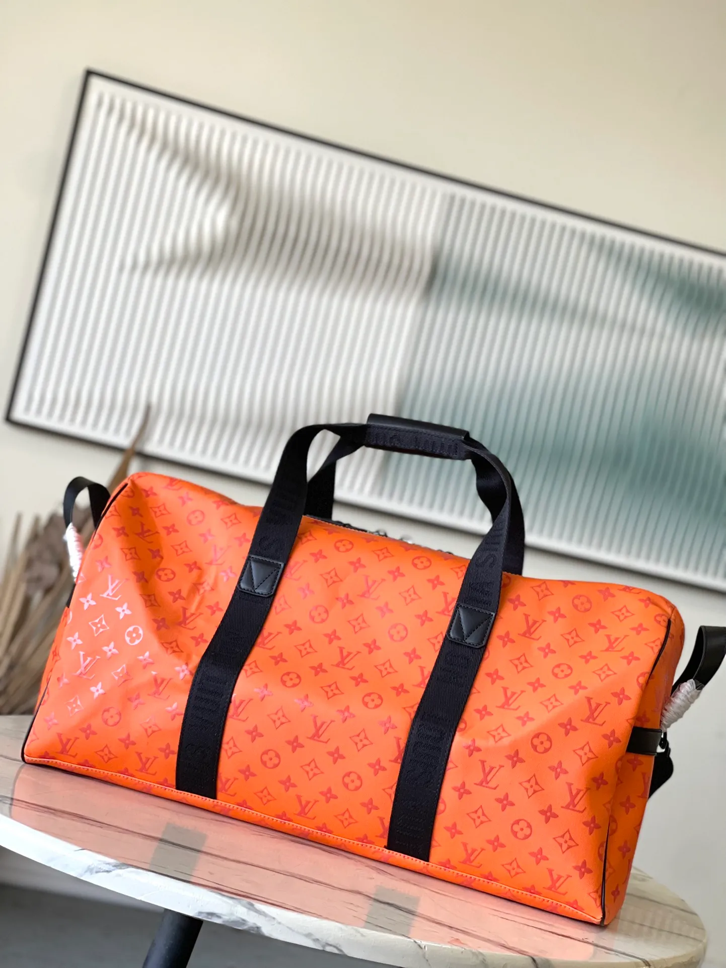 💰1480 Top Original Order M12724 This Keepall Sport travel bag is made of Monogram Storm coated canvas dip-dyed in eye-catching colors, with detachable shoulder straps and side straps to strengthen the structure, highlighting the dynamic style while achieving a comfortable carrying experience. Waterproof zippers keep items wet, and it's complemented by a fabric lining and zipped interior pocket. Dimensions: 55 × 31 × 25 cm