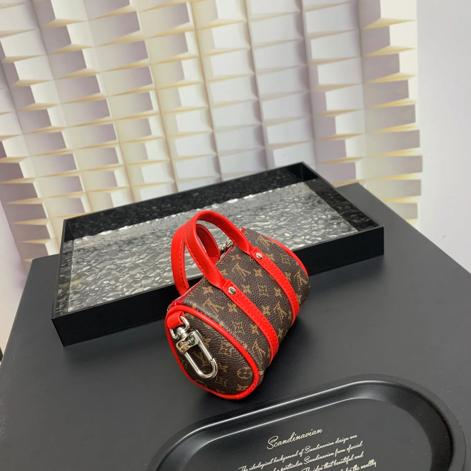 💰200 shipped😍 MINI KEEPALL bag charm and keychain ☀️Louis Vuitton Louis Vuitton lv mini pillow bag pendant ☀️This Mini Keepall bag charm and keychain condenses the classic handbag configuration, boldly showing the spirit of adventure. Monogram canvas with LV inscribed hook buckle, whether hung on a belt or handbag, its zipper closure and built-in keychain ensure secure storage