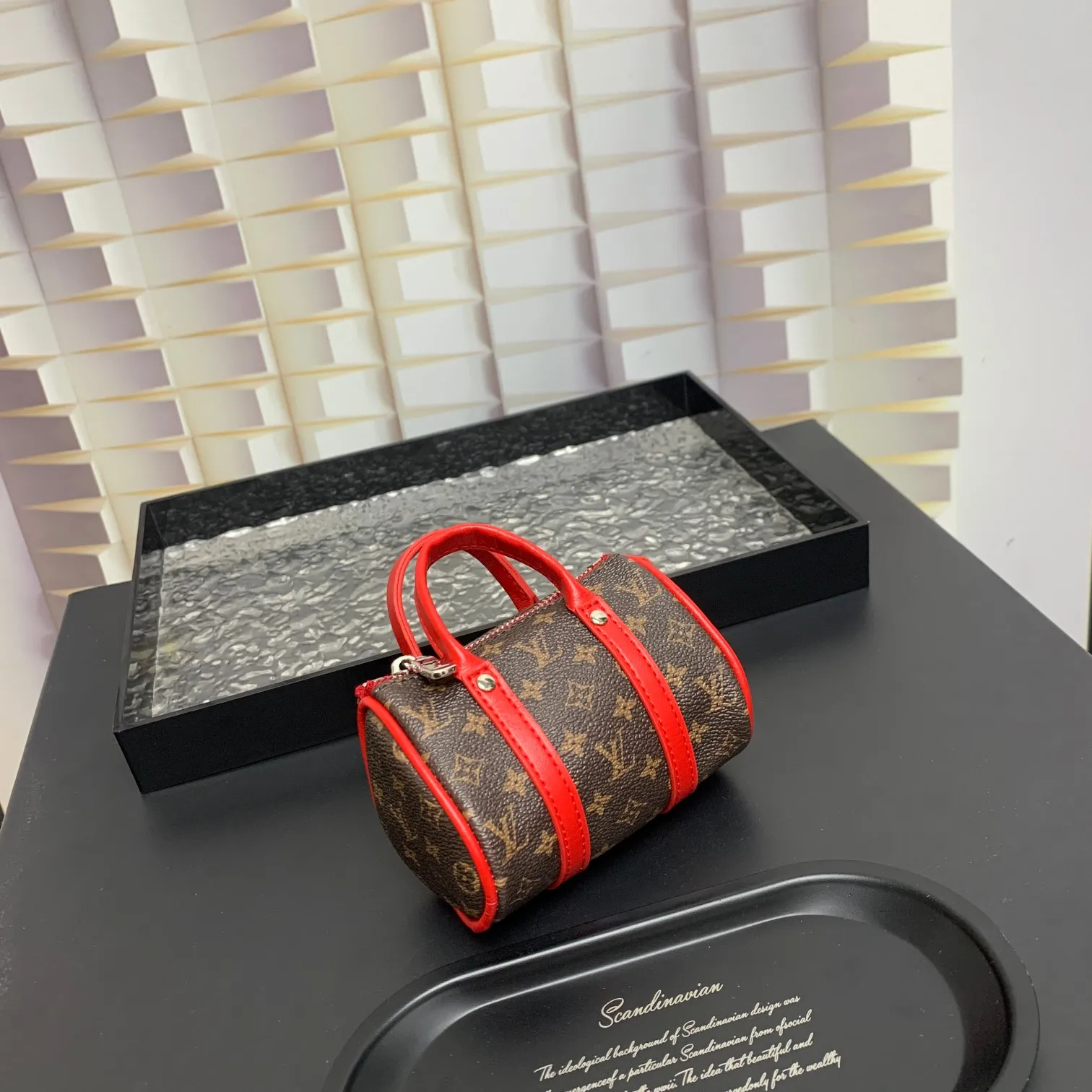 💰200 shipped😍 MINI KEEPALL bag charm and keychain ☀️Louis Vuitton Louis Vuitton lv mini pillow bag pendant ☀️This Mini Keepall bag charm and keychain condenses the classic handbag configuration, boldly showing the spirit of adventure. Monogram canvas with LV inscribed hook buckle, whether hung on a belt or handbag, its zipper closure and built-in keychain ensure secure storage