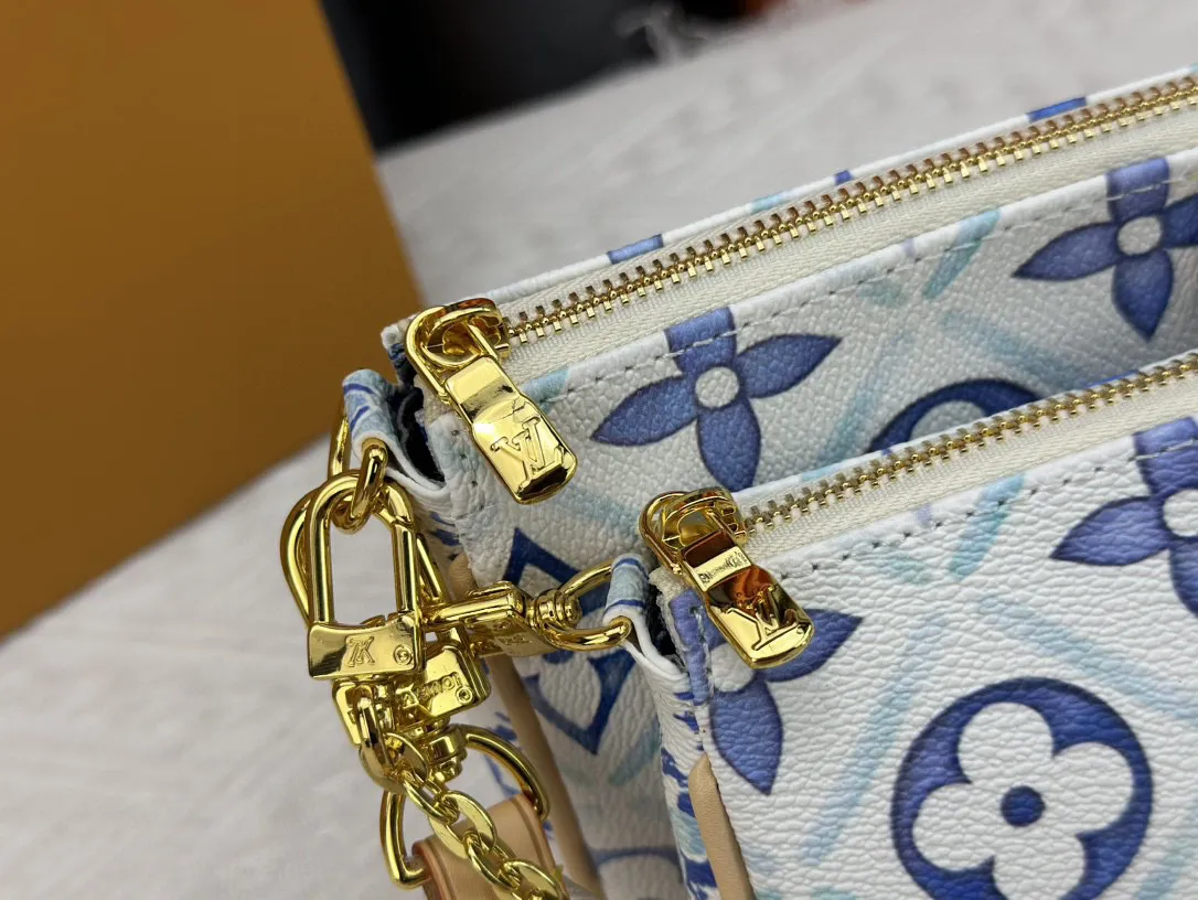 P260 Upgraded version M44823 M25374 Blue Five-in-one Mahjong bag series The new season MULTI POCHETTE ACCESSOIRES Xph handbag This Multi Pochette Accessoires handbag comes from the LV By The Pool series, using Monogram Tiles canvas to release the summer atmosphere, and then the zipper bags are nestled together. Explore more styling and carrying possibilities with the detachable and adjustable wide fabric shoulder strap and dazzling chain. Dimensions: 24 x 13.5x4 cm