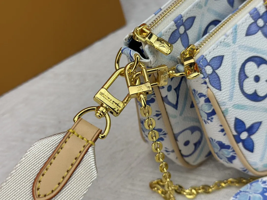 P260 Upgraded version M44823 M25374 Blue Five-in-one Mahjong bag series The new season MULTI POCHETTE ACCESSOIRES Xph handbag This Multi Pochette Accessoires handbag comes from the LV By The Pool series, using Monogram Tiles canvas to release the summer atmosphere, and then the zipper bags are nestled together. Explore more styling and carrying possibilities with the detachable and adjustable wide fabric shoulder strap and dazzling chain. Dimensions: 24 x 13.5x4 cm