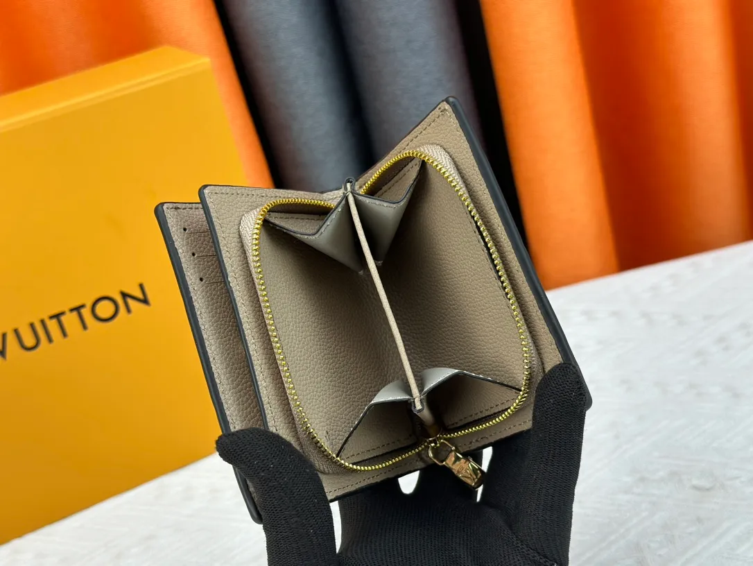 P150LV top replica M80152 This Cléa wallet is made of Monogram Empreinte soft grained cowhide, embellished with Louis Vuitton's iconic Monogram embossed pattern. It has a stylish design, is exquisite and compact but has a spacious capacity. It is equipped with an external patch pocket, zipper coin pocket, banknote compartment and six credit card slots. Dimensions: 12 x 9 x 3.5 cm (length x height x width