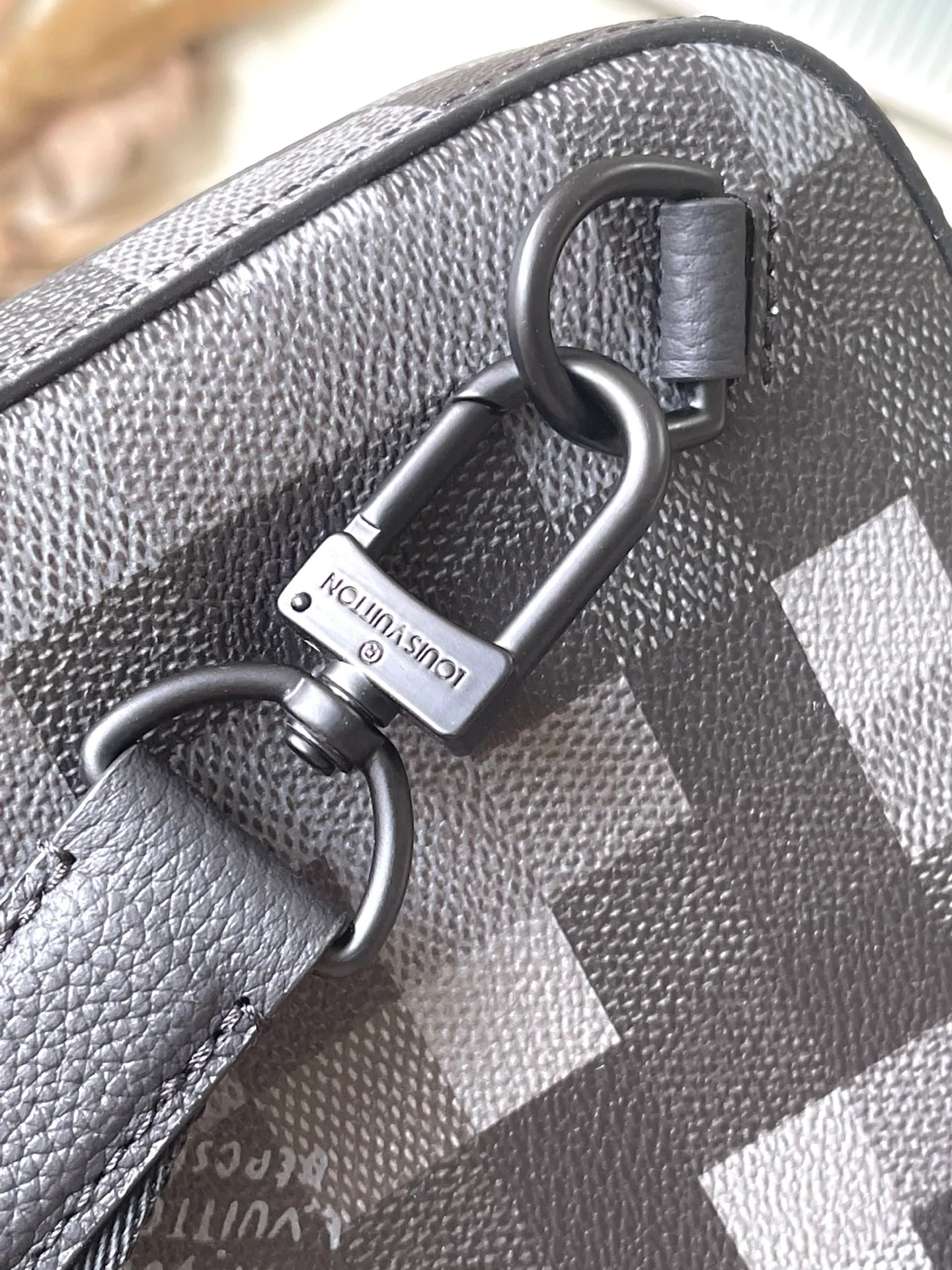 💰900 Top Original M14953 Damoflage black coated canvas adds a contemporary feel to the Avenue Slingbag's modern silhouette. A pixelated checkerboard pattern of grays and blacks is paired with matte black hardware for a masculine look. The Avenue features a main compartment and two zippered pockets for added functionality. The single shoulder strap is adjustable for comfortable cross-body wear. Appearance may vary slightly depending on pattern placement. Size: 16*5.7*33cm
