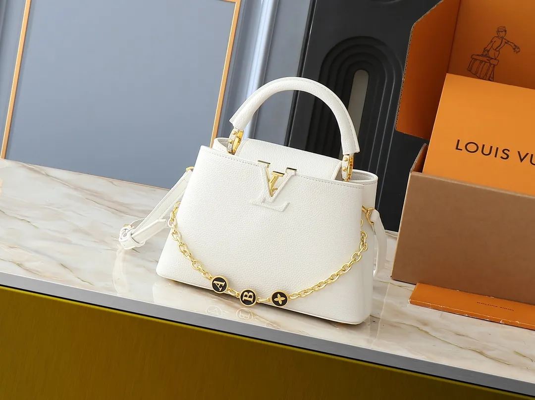 💰400💰Guangzhou goods Upgraded original M00014 M00013 M00015 [New size] This Capucines new size handbag shows soft beauty: Taurillon leather bag body with light-colored flap and top handle, enamel Monogram flower chain can also achieve a shoulder-carrying experience. Wear the slim leather strap to explore more styling possibilities. Dimensions 27 x 17.3 x 9 cm (length x height x width)
