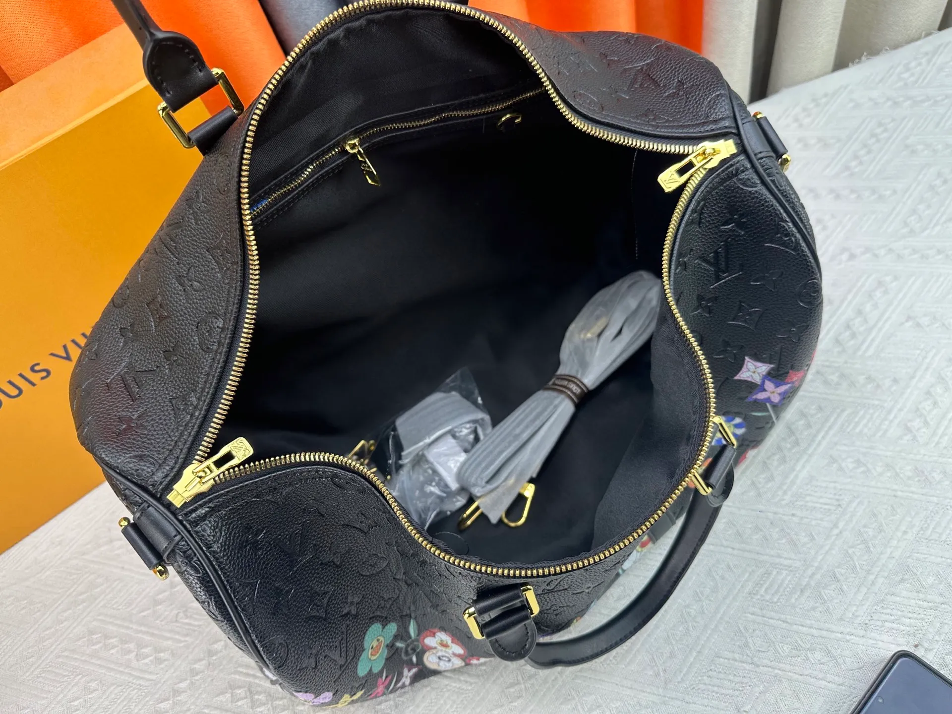 P360 new arrival M14182 M41416 LV2025 spring and summer joint model with Takashi Murakami Fashion is a cycle to celebrate the 20th anniversary of the joint brand Size: 50.0X27.0X20.0cm