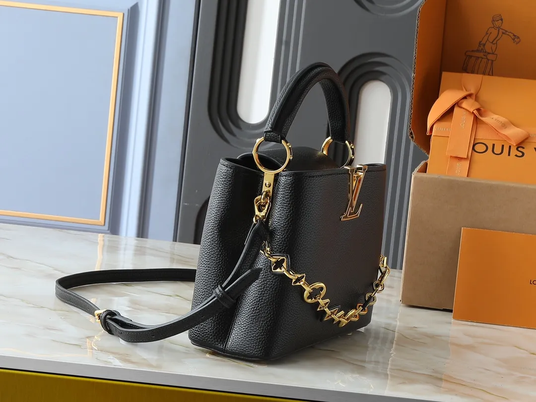 💰440💰Guangzhou goods Upgraded from the original M14381 M14970 M14393 M14972 M14971 This Capucines BB handbag quotes the design elements of the Harmony series and tells the inspiration of the Monogram flower with a gorgeous chain. The Taurillon cow leather body is embellished with a resin-coated LV logo, and the flap can be opened externally or internally to reveal a neat interior with multiple pockets. Dimensions: 27.0 x 17.3 x 9.0 cm (length x height x width)