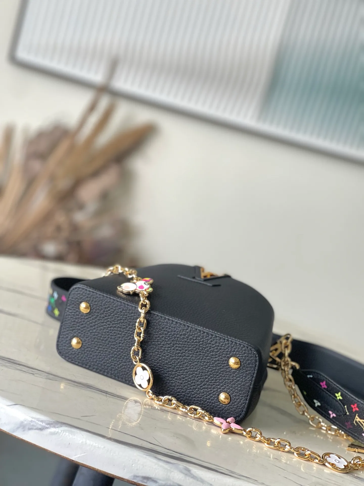 💰2340 "Special Original Leather" M13878 Mini Black with Tricolor Reinterpretation of this season's signature in the X Murakami series showing lightness and charm, displaying Haus's iconic Capuchin handbag, Torion leather material, symbolic initials, detachable chain strap decorated with Monogram flowers, golden hardware such as a cheerful panda character reflected in the super flat style unique to Japanese artist Takashi Murakami Multi-color Monogram pattern with vibrant dots added to the strap and lining Size: 21 * 13.6 * 8 CM
