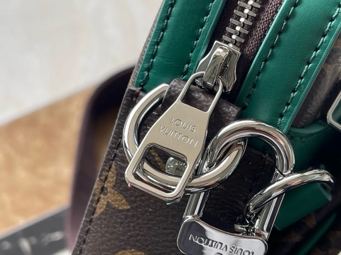 💰800 Top Original Order M12766 This Trio messenger bag is made of Monogram Macassar coated canvas, and then uses bright cow leather to outline the edges and other details. The main compartment and removable zippered front pocket provide storage, and the removable small coin purse secures via the shoulder strap's D-ring. Dimensions: 25 × 18.5 × 7cm