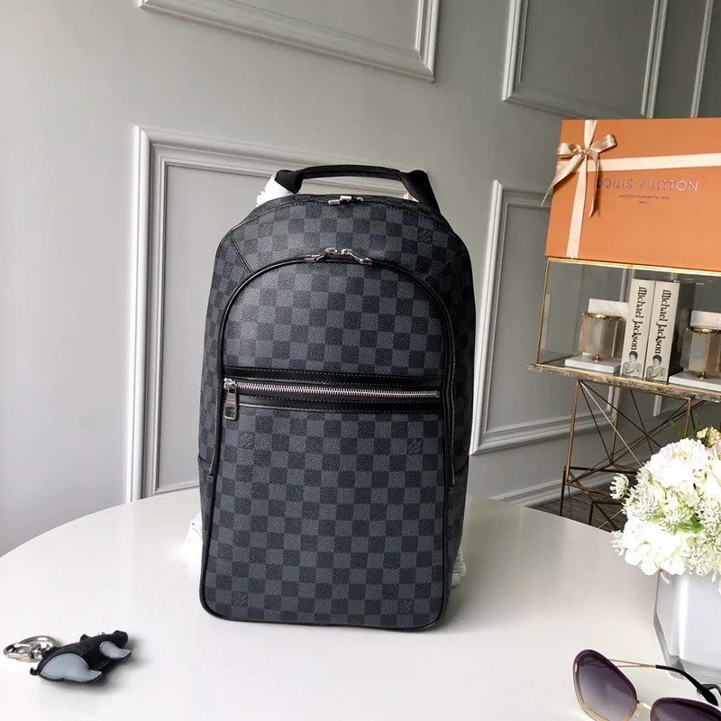 💰1100 top-quality original actual photos ⭕️⭕️ 🌱N58024 This Michael backpack is made of Damier Graphite canvas, lightweight, stylish and comfortable. It can hold a laptop, books and other necessities for both work and leisure. 26 x 45 x 17 cm (Length x Height x Width) - Damier Graphite canvas - Carry-on dimensions - Two exterior zippered pockets - Computer compartment with thermocompressed foam padding - Mobile phone pocket - Double zipper closure for security and convenience - With D-ring for keys