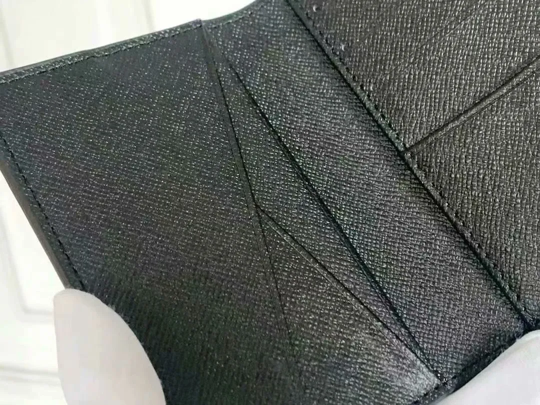 P90 Small Card Holder Louis Vuitton's pocket leather wallet has seven compartments, which can hold credit cards, bus cards, business cards, and even city maps. Damier canvas, leather-bound - two credit card compartments - four inner compartments - one outer compartment. Model M63144 Size 7X11.