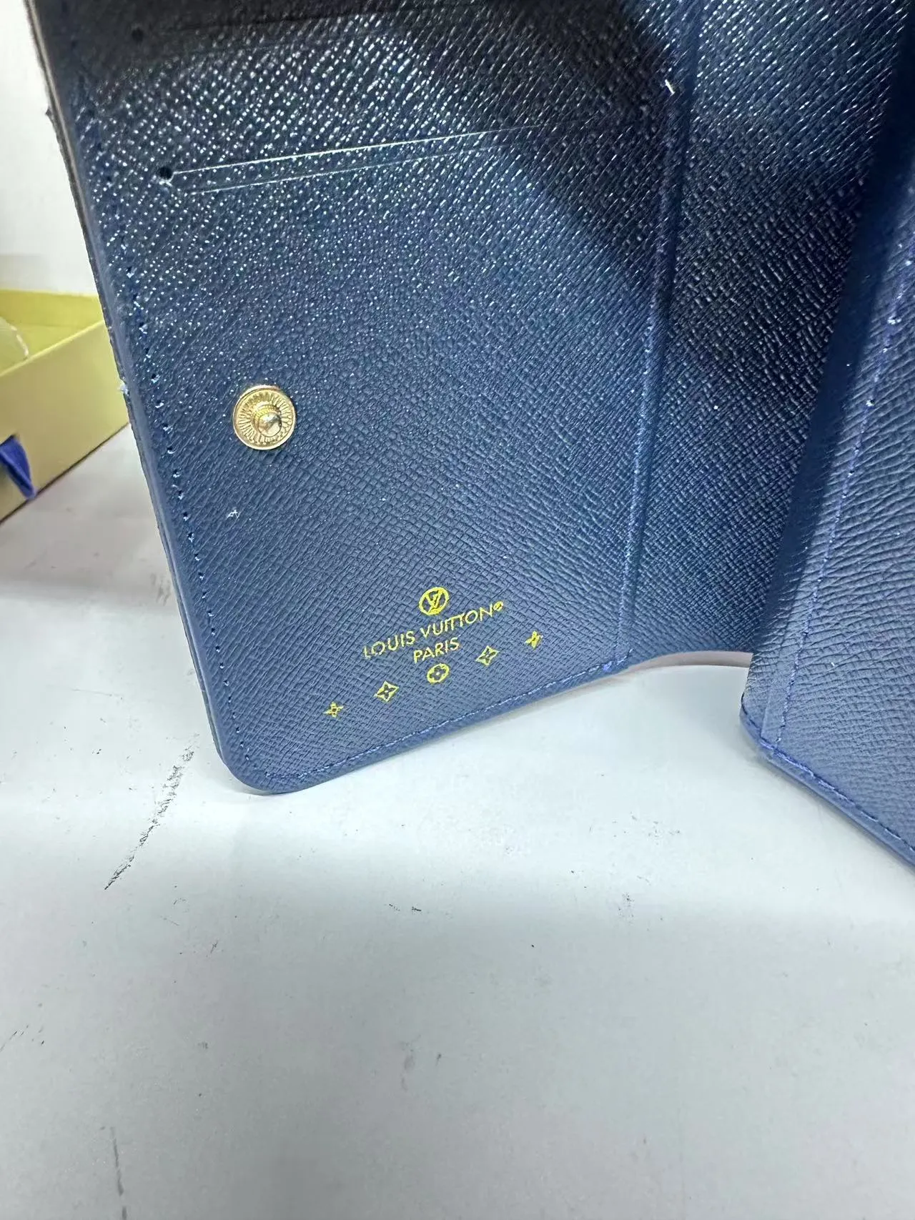 P150 M83689 This Cléa wallet is made of Monogram Empreinte soft grained cowhide, embellished with Louis Vuitton's iconic Monogram embossed pattern. It has a stylish design, is compact yet spacious, and is equipped with an external patch pocket, zipper coin pocket, banknote compartment and six credit card slots.