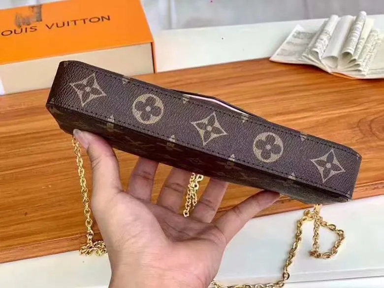 P140 Model: 61276 Size 21/11/2 Introduction: The Louis vuitton Felicie three-piece handbag is elegant and luxurious. It contains two detachable pockets and is a fashionable choice for carrying and organizing your daily necessities. It is more than just a wallet, after removing the gold chain, it can also be used as a charming clutch or small handbag ""