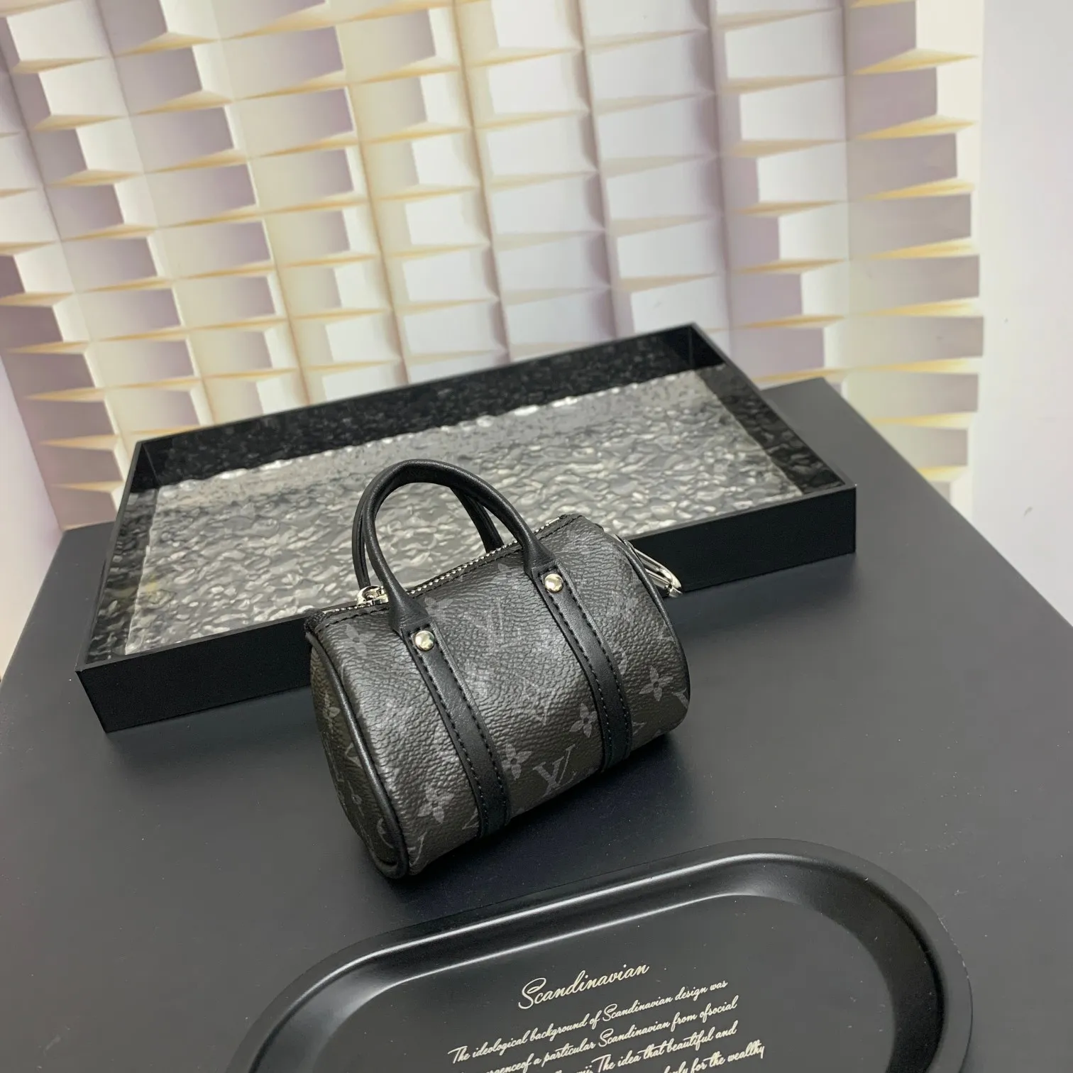 💰200 shipped😍 MINI KEEPALL bag charm and keychain ☀️Louis Vuitton Louis Vuitton lv mini pillow bag pendant ☀️This Mini Keepall bag charm and keychain condenses the classic handbag configuration, boldly showing the spirit of adventure. Monogram canvas with LV inscribed hook buckle, whether hung on a belt or handbag, its zipper closure and built-in keychain ensure secure storage