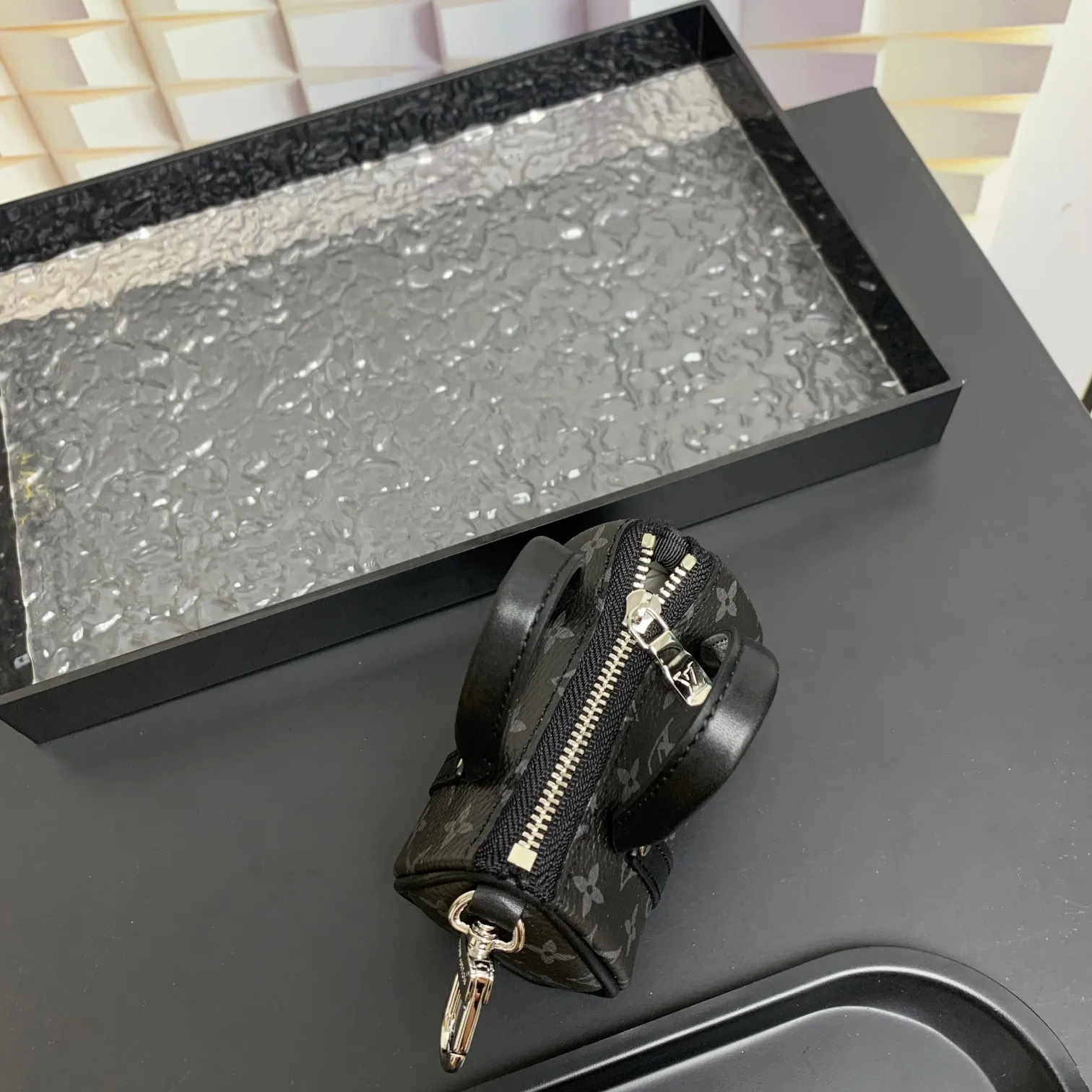 💰200 shipped😍 MINI KEEPALL bag charm and keychain ☀️Louis Vuitton Louis Vuitton lv mini pillow bag pendant ☀️This Mini Keepall bag charm and keychain condenses the classic handbag configuration, boldly showing the spirit of adventure. Monogram canvas with LV inscribed hook buckle, whether hung on a belt or handbag, its zipper closure and built-in keychain ensure secure storage