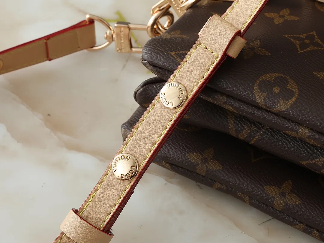 💰240💰Upgraded from the original M59598 M59389 M59396 M13233 M21259 M25218 M20770 M11401 This Coussin BB handbag is made of soft sheep leather with an embossed Monogram pattern. It has an inner compartment in a compact silhouette, making it an elegant choice for both day and night. Both the chunky chain and slim leather strap are removable, allowing for a variety of styling possibilities. Dimensions: 21.0 x 16.0 x 7.0 cm (length x height x width)