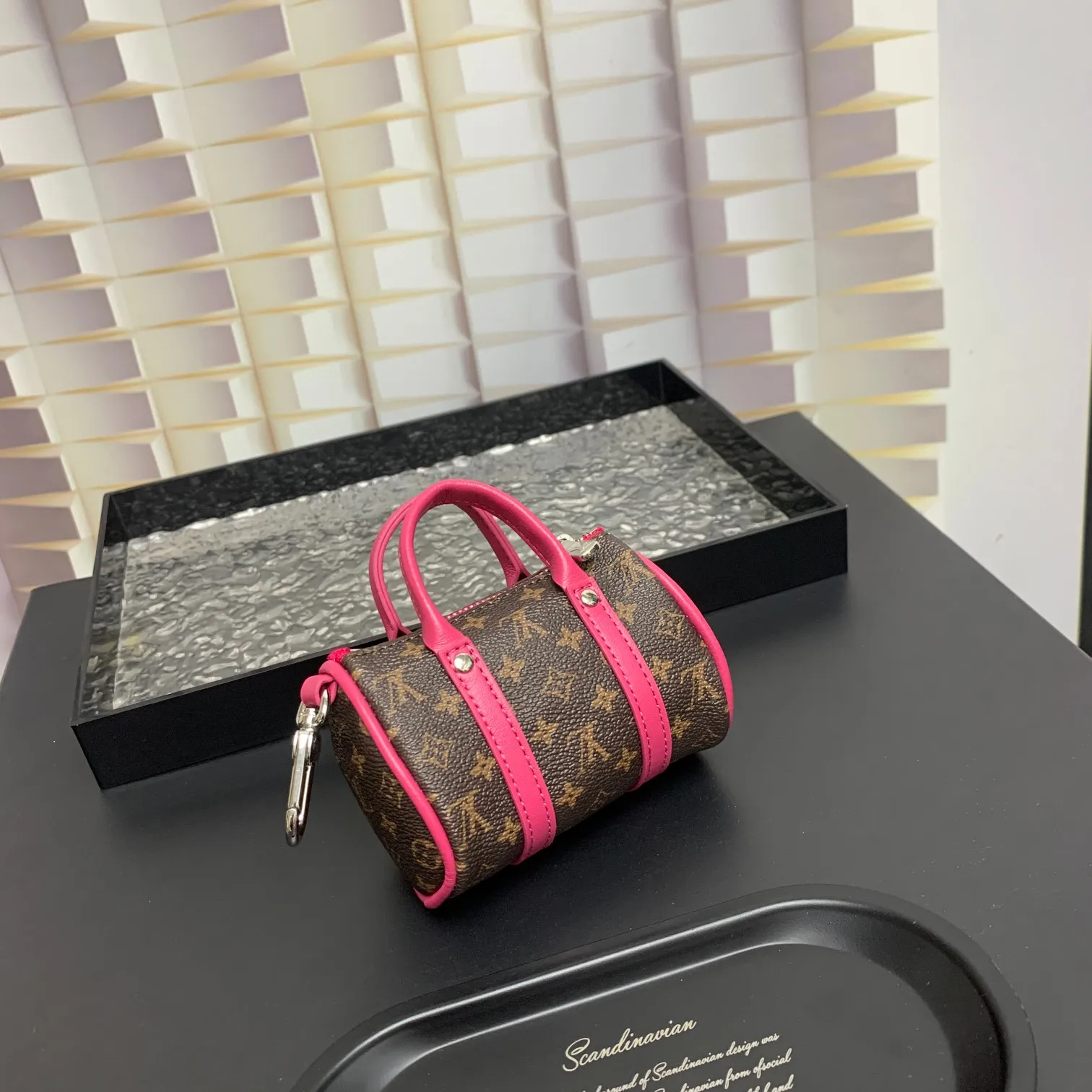 💰200 shipped😍 MINI KEEPALL bag charm and keychain ☀️Louis Vuitton Louis Vuitton lv mini pillow bag pendant ☀️This Mini Keepall bag charm and keychain condenses the classic handbag configuration, boldly showing the spirit of adventure. Monogram canvas with LV inscribed hook buckle, whether hung on a belt or handbag, its zipper closure and built-in keychain ensure secure storage