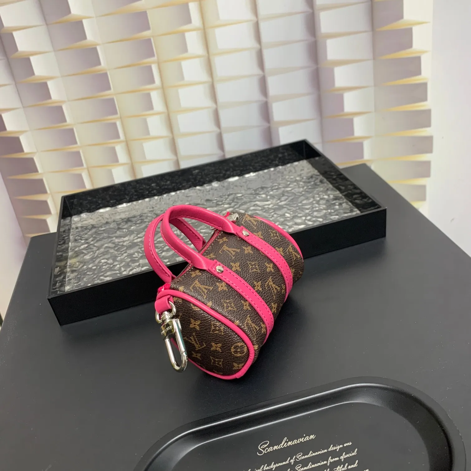 💰200 shipped😍 MINI KEEPALL bag charm and keychain ☀️Louis Vuitton Louis Vuitton lv mini pillow bag pendant ☀️This Mini Keepall bag charm and keychain condenses the classic handbag configuration, boldly showing the spirit of adventure. Monogram canvas with LV inscribed hook buckle, whether hung on a belt or handbag, its zipper closure and built-in keychain ensure secure storage