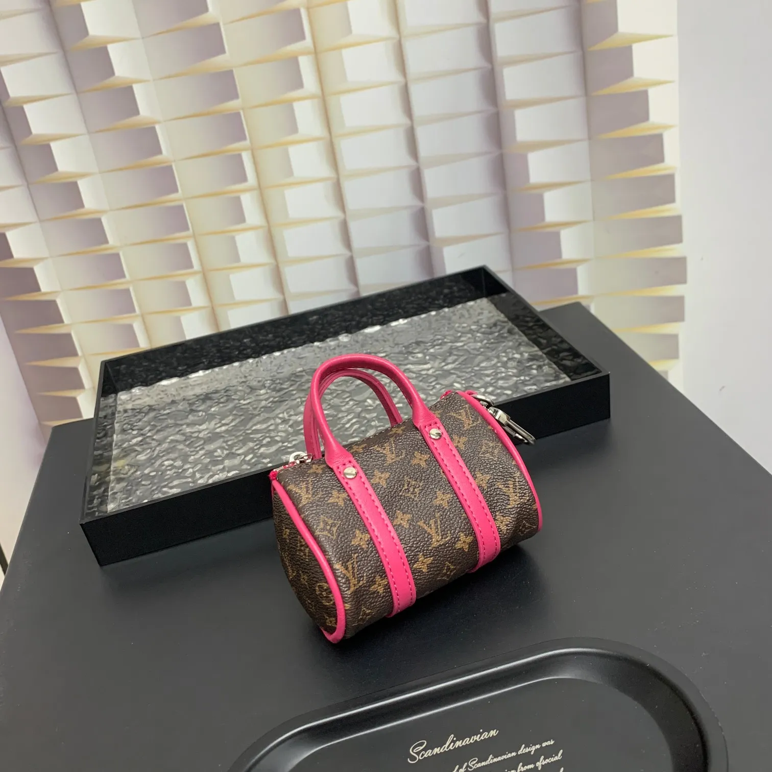 💰200 shipped😍 MINI KEEPALL bag charm and keychain ☀️Louis Vuitton Louis Vuitton lv mini pillow bag pendant ☀️This Mini Keepall bag charm and keychain condenses the classic handbag configuration, boldly showing the spirit of adventure. Monogram canvas with LV inscribed hook buckle, whether hung on a belt or handbag, its zipper closure and built-in keychain ensure secure storage