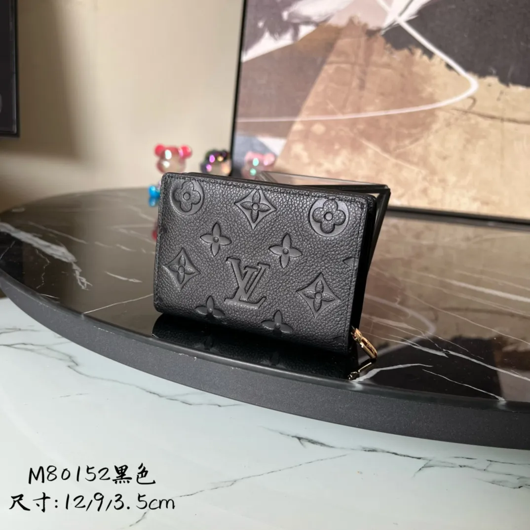Factory price 480 Top original order M80152 Black This Cléa wallet is made of Monogram Empreinte soft grained cowhide, embellished with Louis Vuitton's iconic Monogram embossed pattern. It has a stylish design, is exquisite and compact but has a spacious capacity. It is equipped with an external patch pocket, zipper coin pocket, banknote compartment and six credit card slots. Details 12 x 9 x 3.5 cm (Length x Height x Width) Turtledove beige Soft grained embossed cowhide Leather lining Gold-tone hardware Snap-button closure Compartment for notes Accordion zip coin pocket External patch pocket Inner card compartment 6 credit card slots