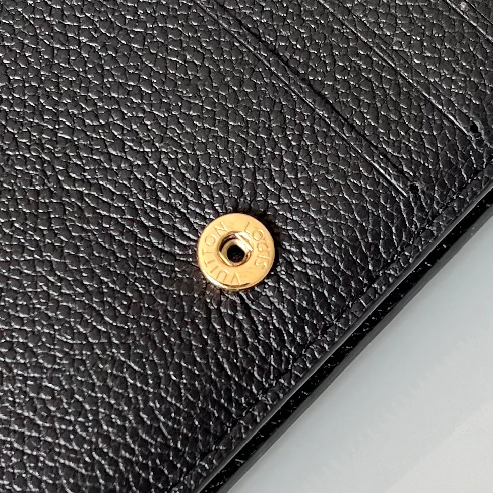 Factory price 480 Top original order M80152 Black This Cléa wallet is made of Monogram Empreinte soft grained cowhide, embellished with Louis Vuitton's iconic Monogram embossed pattern. It has a stylish design, is exquisite and compact but has a spacious capacity. It is equipped with an external patch pocket, zipper coin pocket, banknote compartment and six credit card slots. Details 12 x 9 x 3.5 cm (Length x Height x Width) Turtledove beige Soft grained embossed cowhide Leather lining Gold-tone hardware Snap-button closure Compartment for notes Accordion zip coin pocket External patch pocket Inner card compartment 6 credit card slots