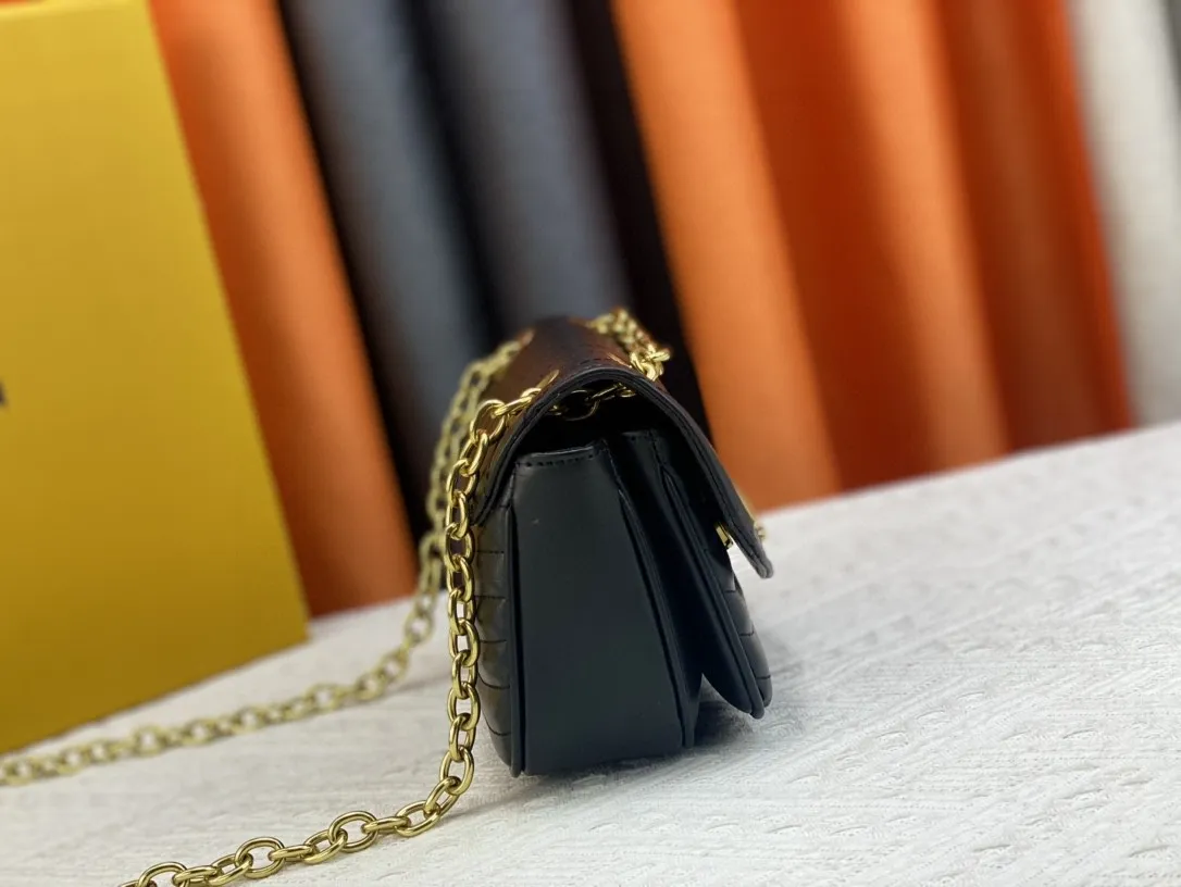 P240 Upgraded original quality M20686 M20685 M20383 20687 New Wave small chain bag combines Wave chain bag and Multi Pochette Accessoires handbag. Padded quilted cowhide leather creates a wavy configuration Sliding chain shoulder strap for long or short shoulder and cross-body wear Features 21 x 12 x 9 cm (Length x Height x Width) Quilted cowhide Leather Smooth cowhide trim Microfiber lining Distressed hardware